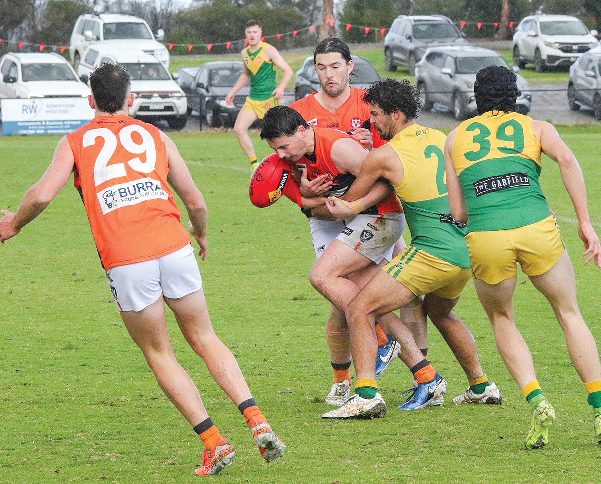Garfield’s Joseph Zaccari and the Giants’ Jayden Deas look for opportunities as the Giants are dispossessed.