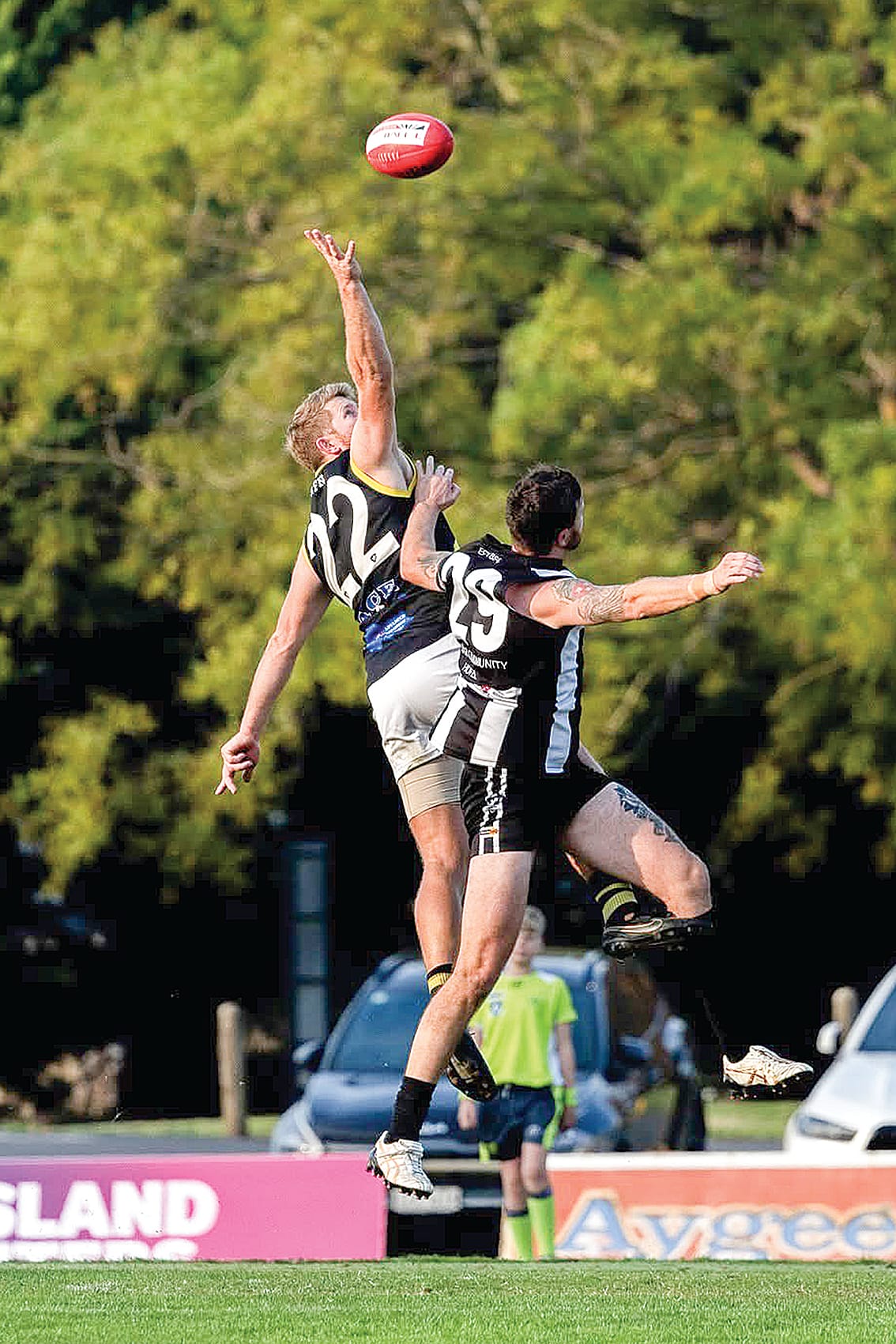 Joe Brooks leaps up in the ruck. Photo: Annie Holland.