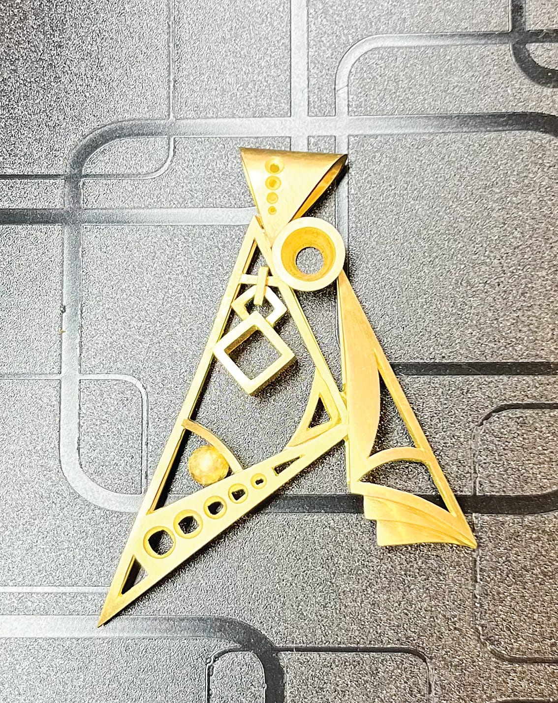 Lily-Grace designed part of, and put together a three-module pendant piece, created from 18-karat yellow gold, in just three days. 