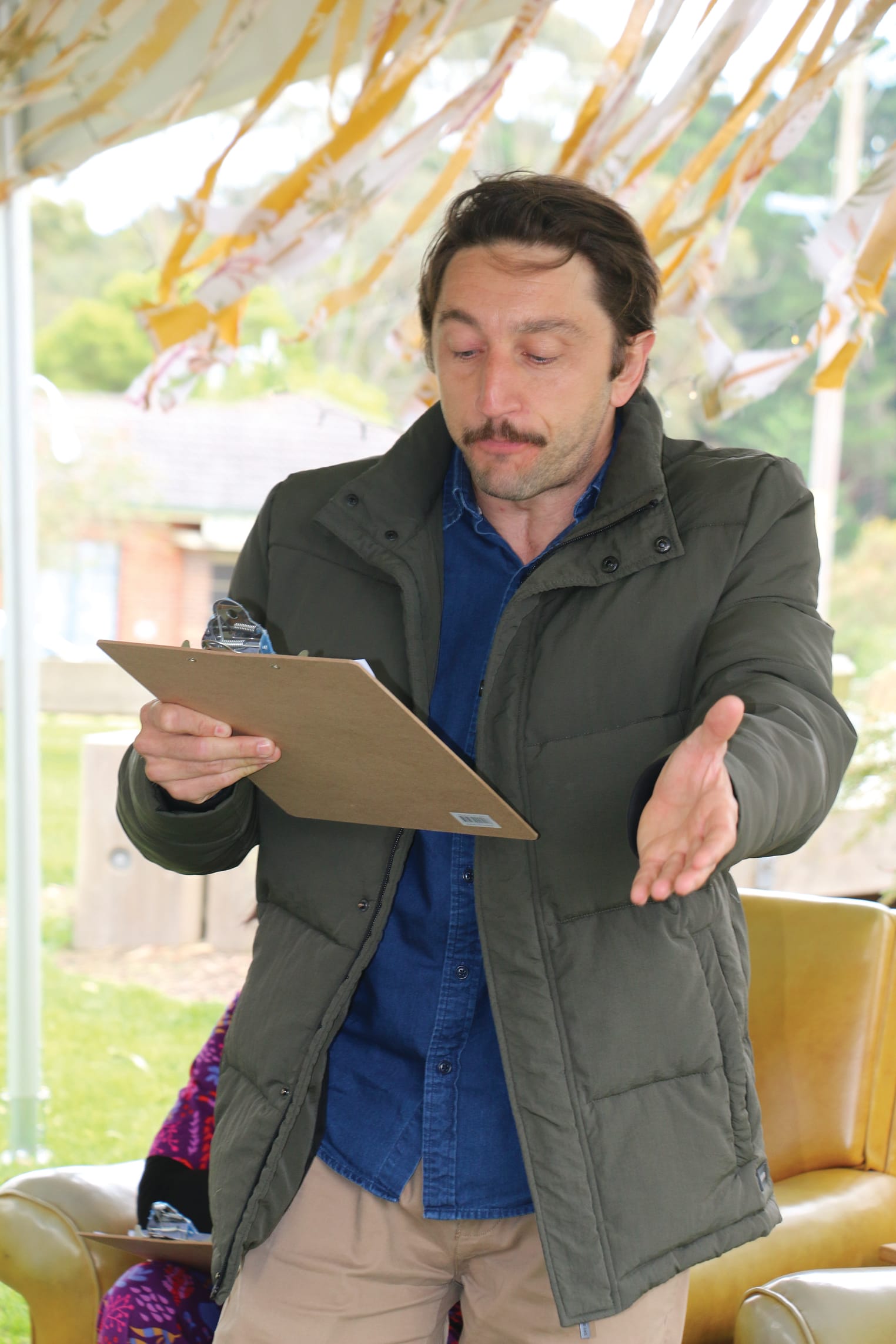 Troy Larkin performing one of the entries in the writing challenge at Fishy Stories. tk05_4723