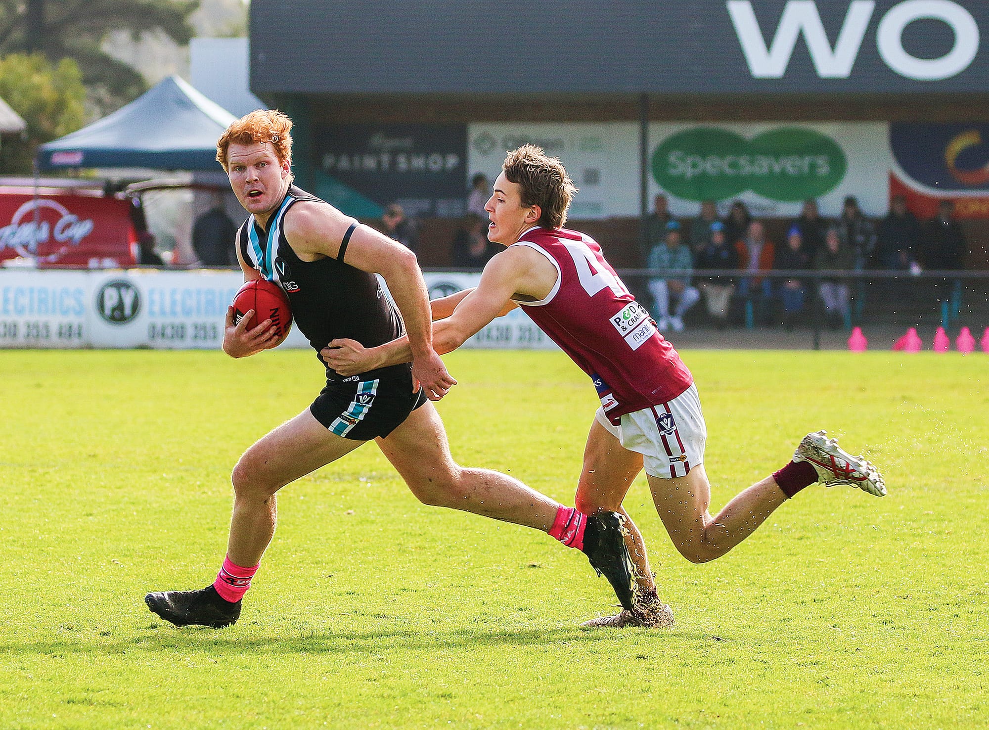 Kyle Reid escapes the clutches of a Traralgon player.