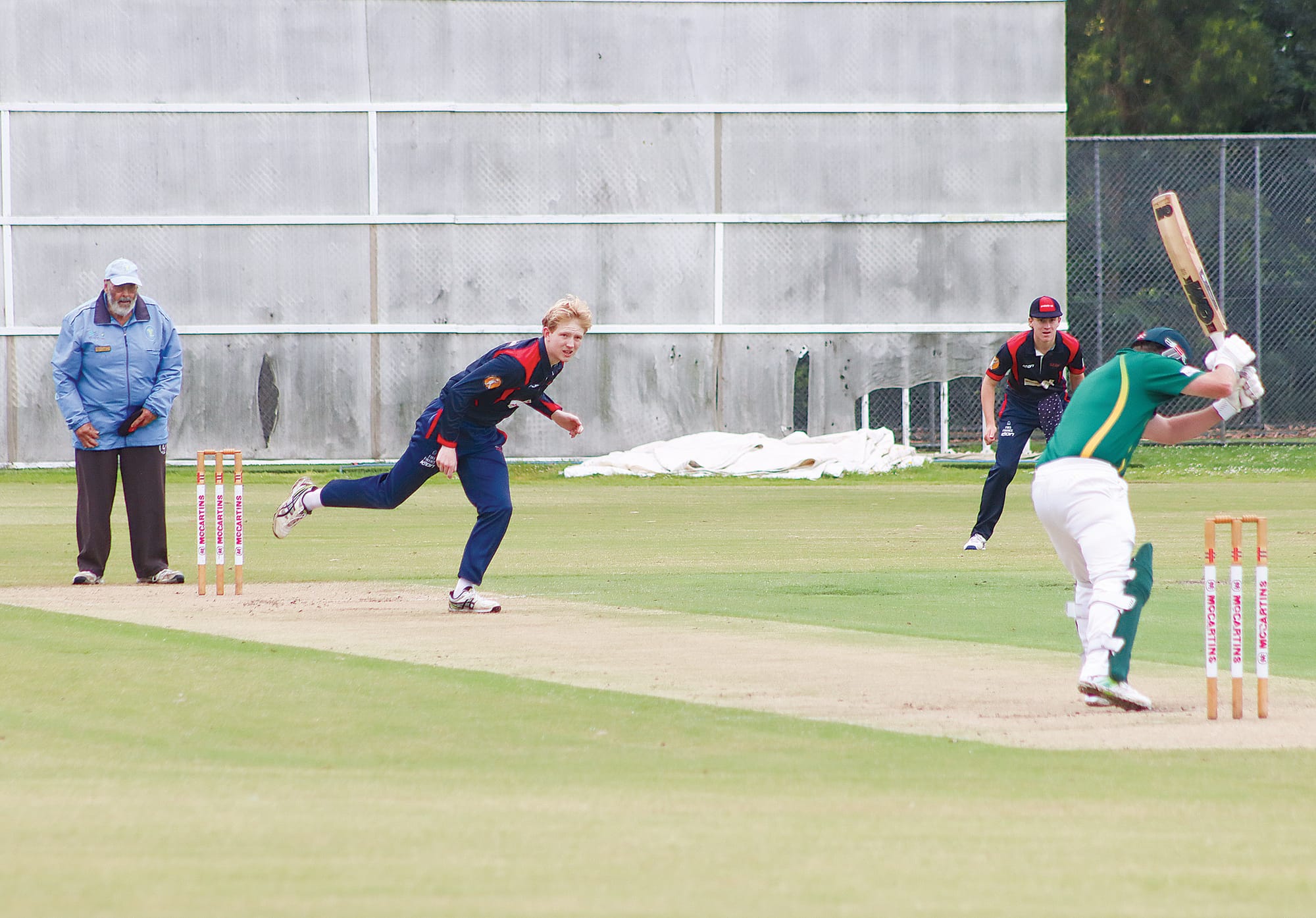 Luke Ashton of Leongatha Town leaves an Isaac Seuren delivery. A23_0324