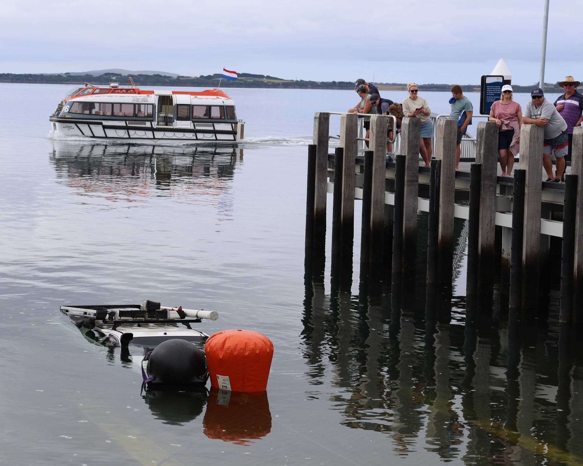 Passengers from the cruise ship Noordam may have noticed the salvage operation going on at the Rhyll Boat Ramp where a car and boat trailer became submerged.