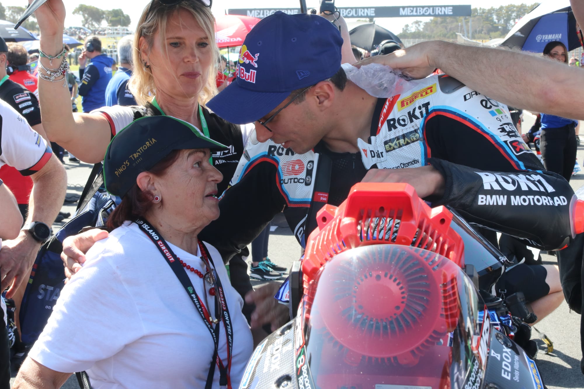 World Superbike staple Rosa Scarlato (Pino's Trattoria) takes a moment ahead of Race 2 with Toprak Razgatlioglu. 