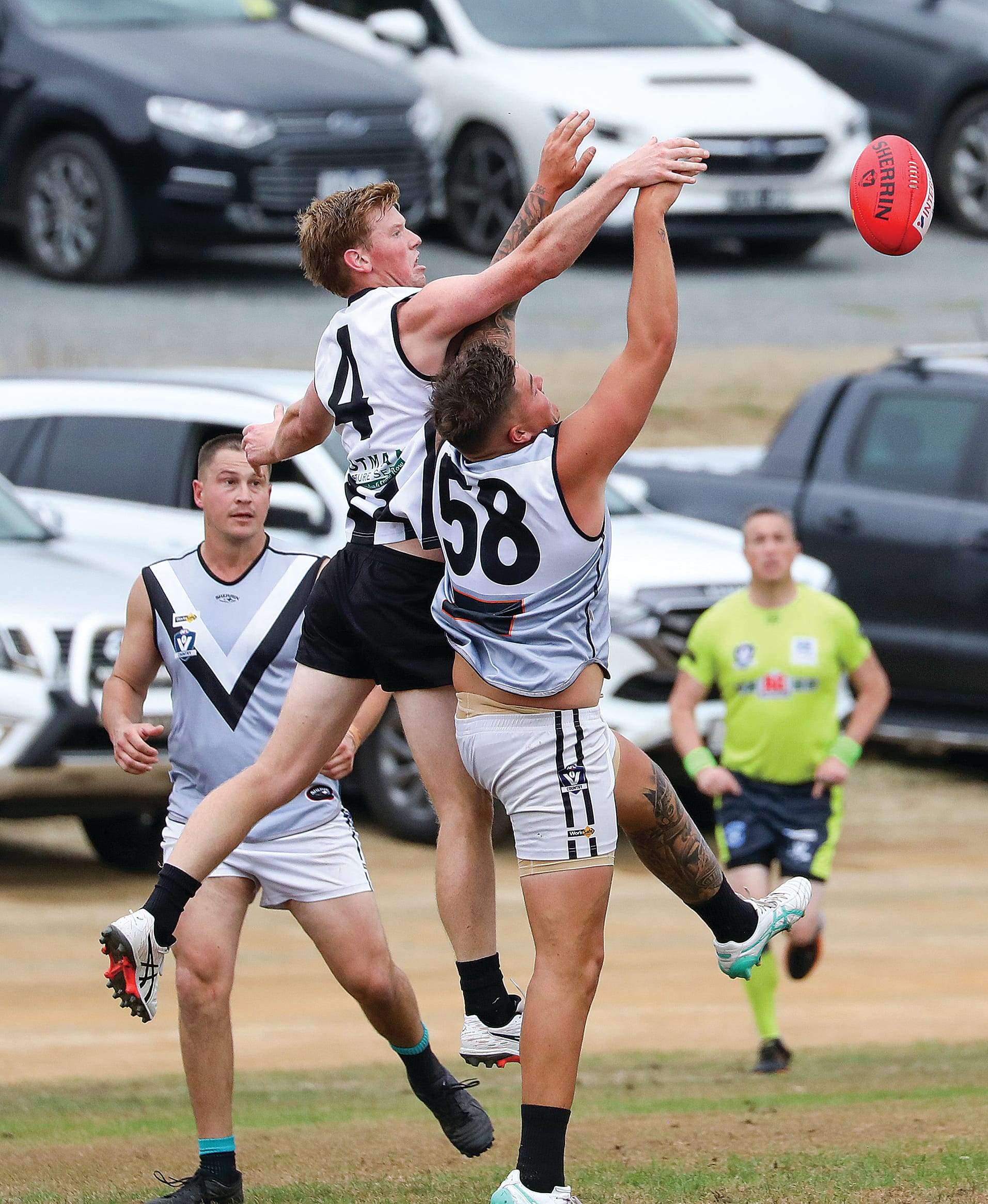 Zac Gray battles it out for Poowong on Saturday. Photo: Jeff Tull.