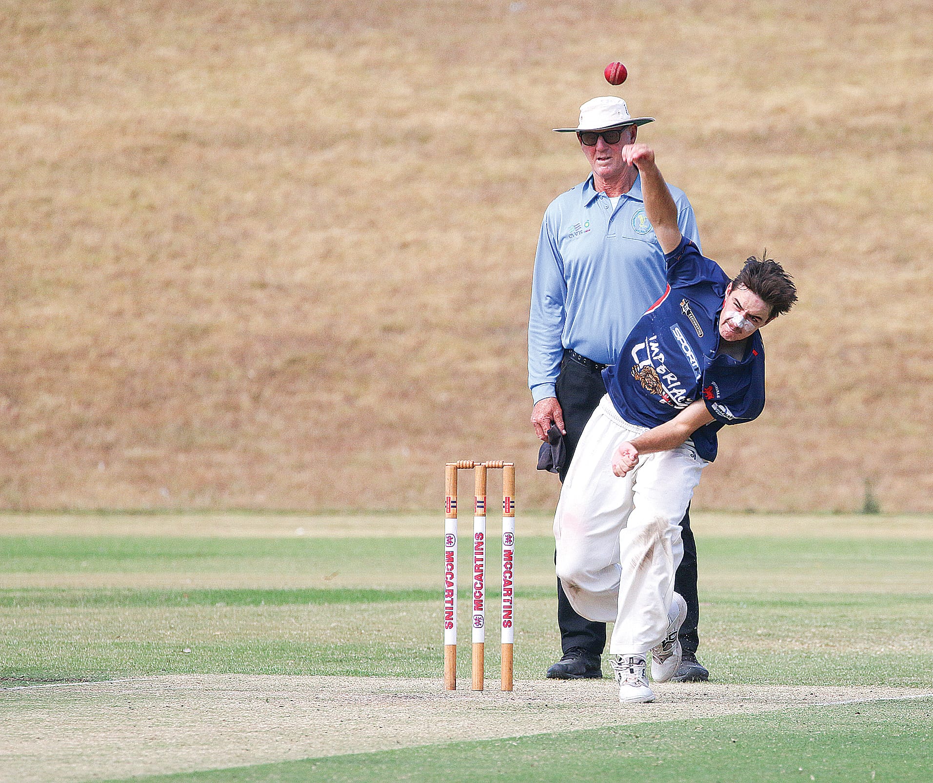 Zavier Lamers bowls for the Imperials in the U17s grand final.