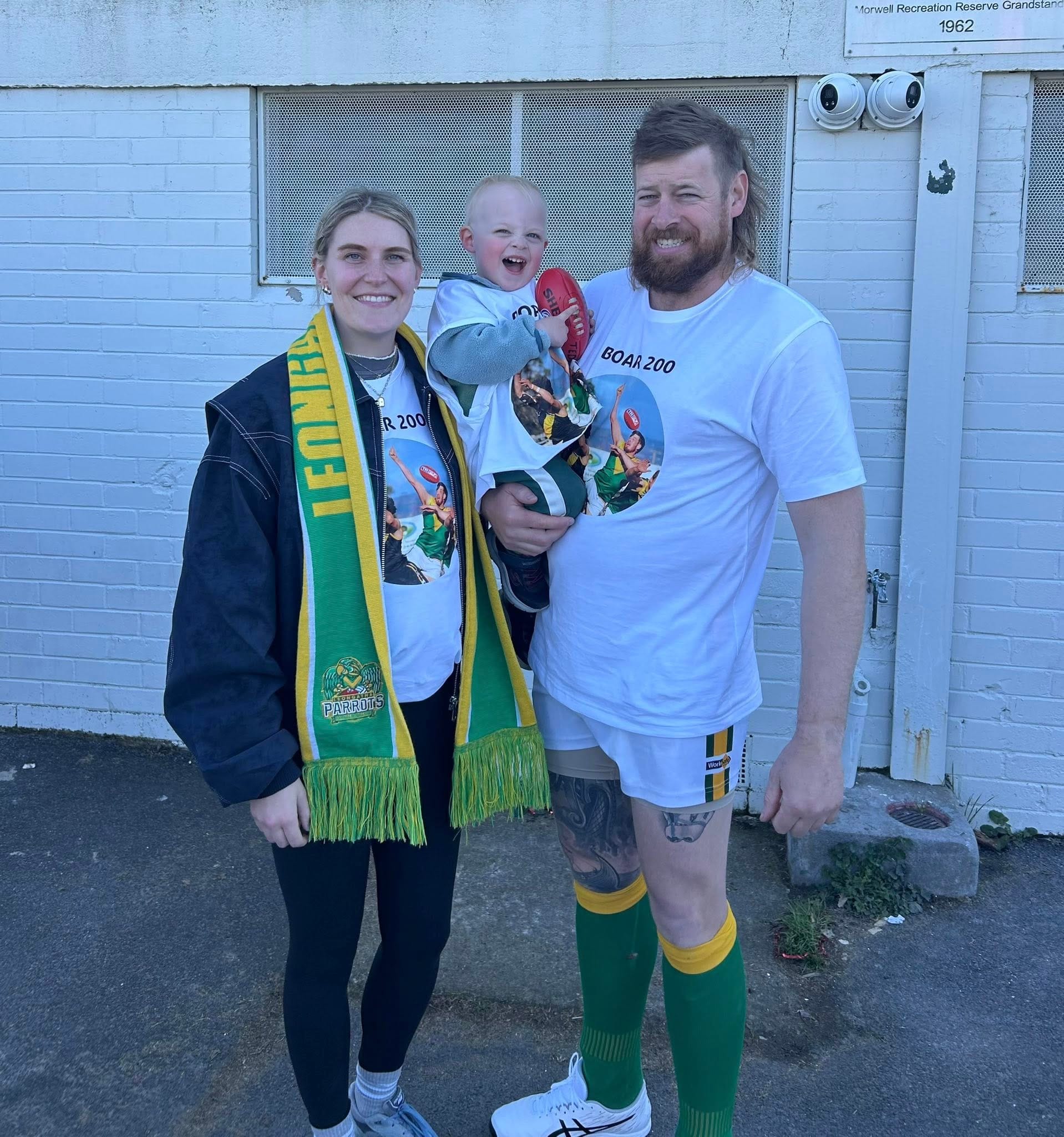 Son Ted and wife Ashlea show their support for Ben Willis as he celebrates his 200th Senior game.