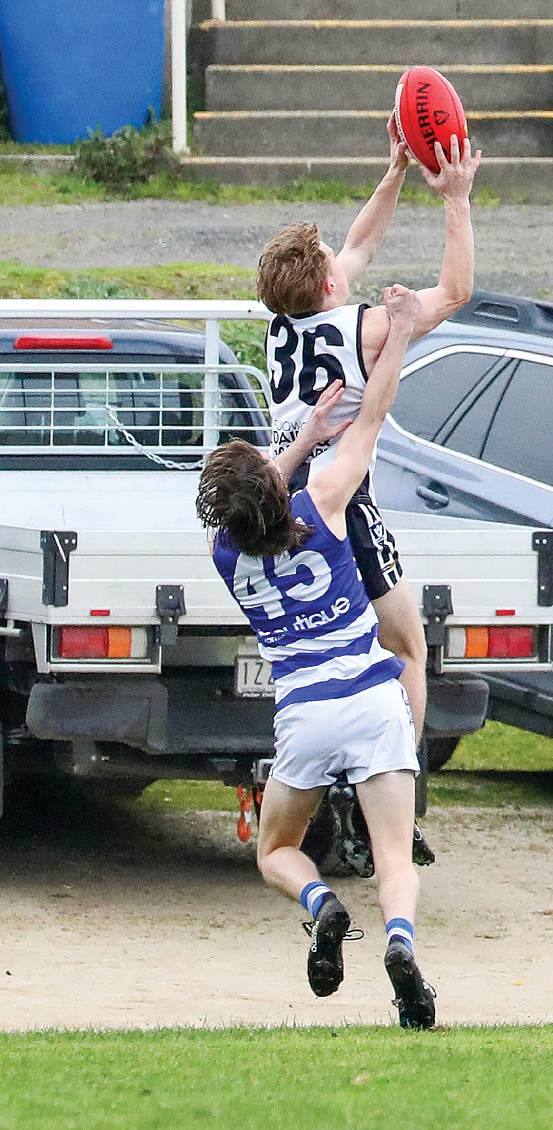 Patrick Dorian flies for Poowong in the Under 18s, his game including a goal in the win over Neerim South. Photo: Jeff Tull.