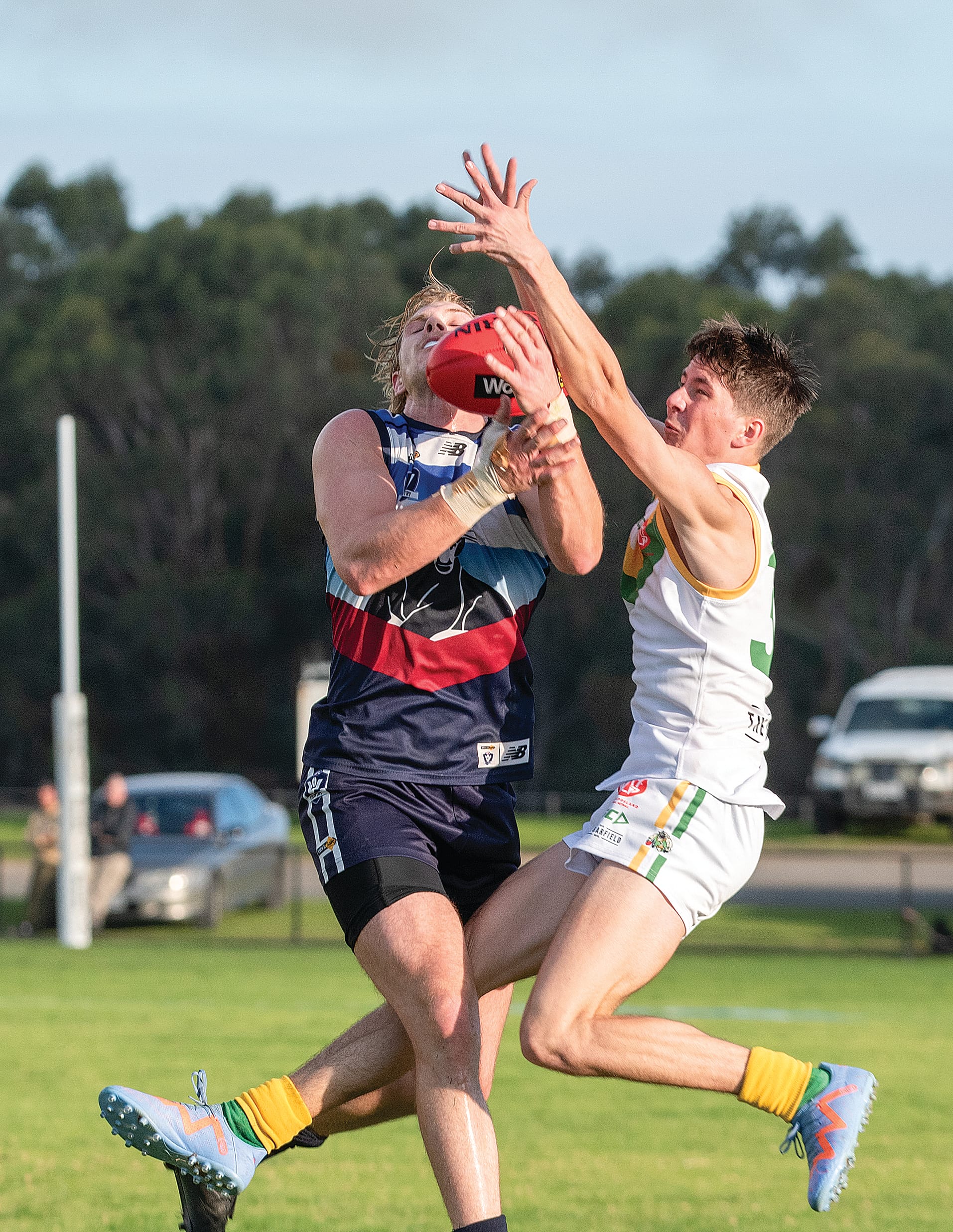 Lochlan Scott takes a mark for Kilcunda-Bass