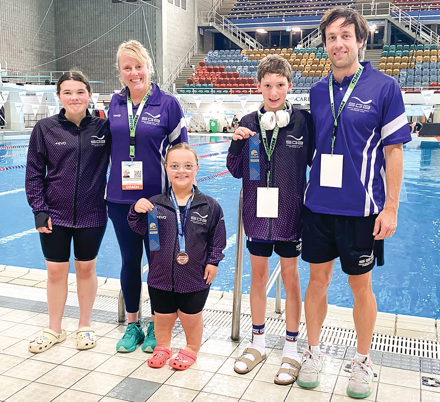 Coaches Lorri and Dylan with first-timers Levi Jarrett and Georgia Perry, and returning swimmer Gemma Cook. 