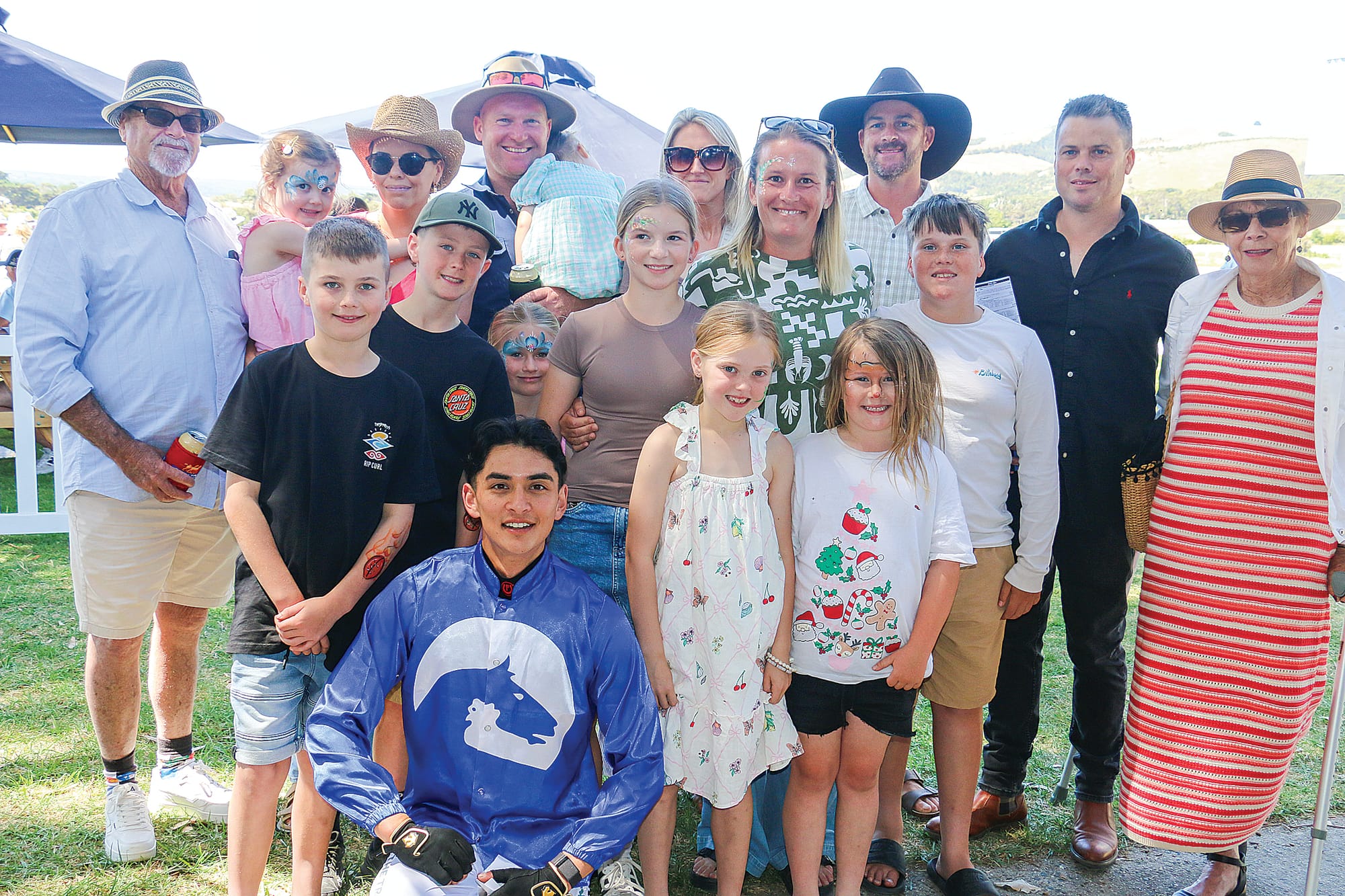 The Fisher family with winning jockey Dylan Dean at the Woolamai and District Racing Club. The Fisher family sponsored race three – the Fisher Family Christmas Maiden Plate. 