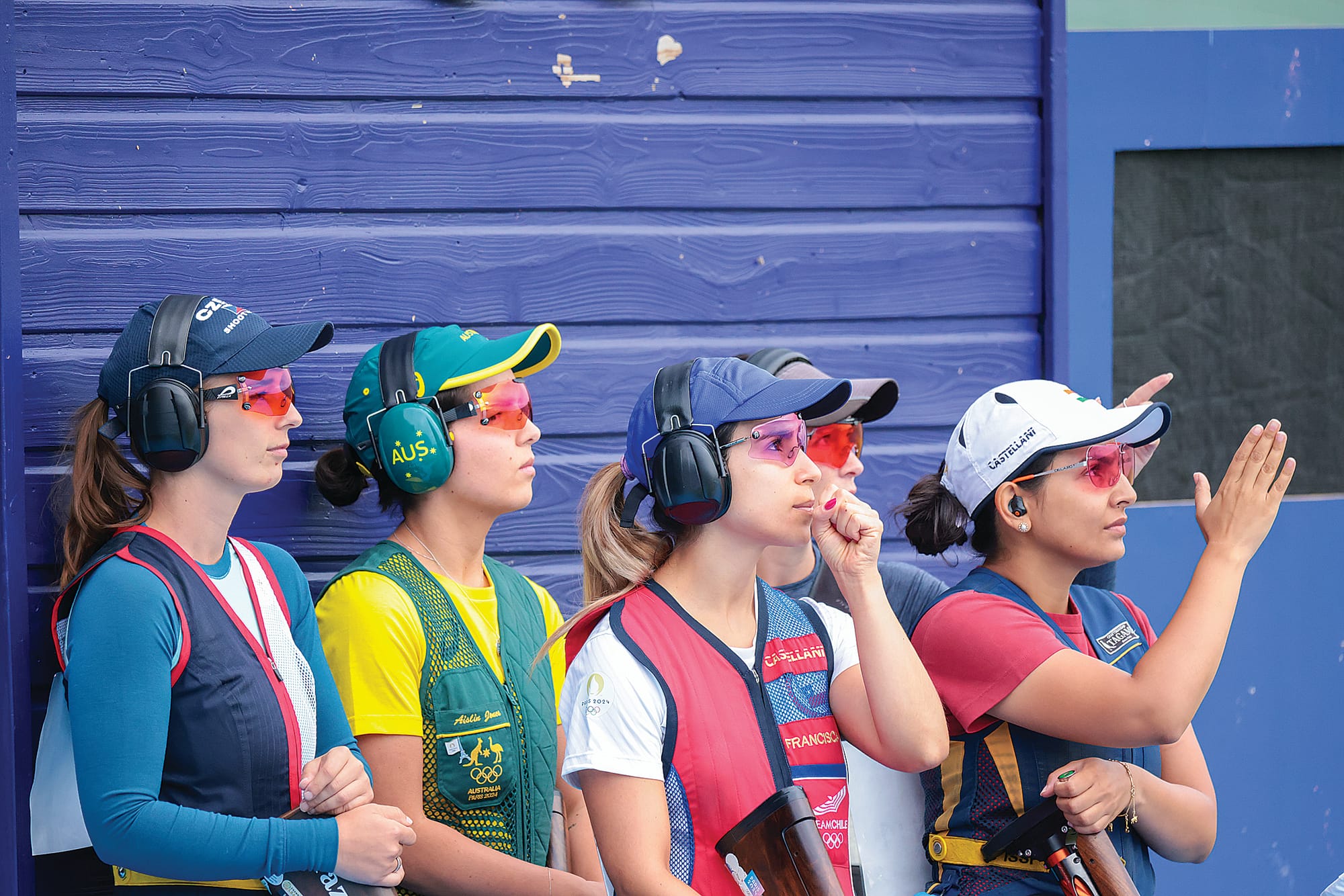 Aislin watches the target test in the female skeet heat. Photo: Nathalie Gallois ISSF.