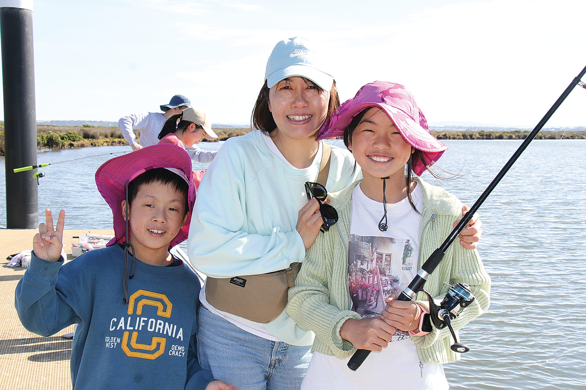 Chika with children Sota and Saeli enjoying the school holidays fishing at Venus Bay. B14_1525