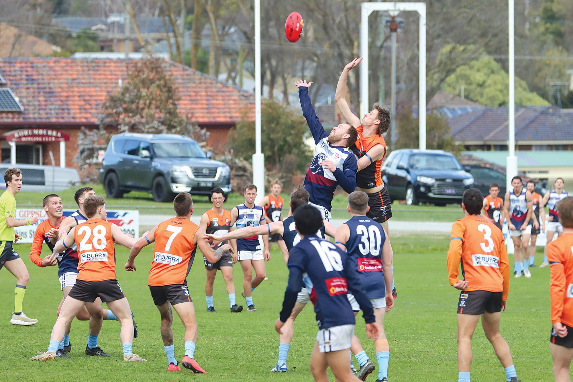 Kilcunda-Bass and Korumburra-Bena get numbers around the ball during a competitive opening quarter. A18_3324