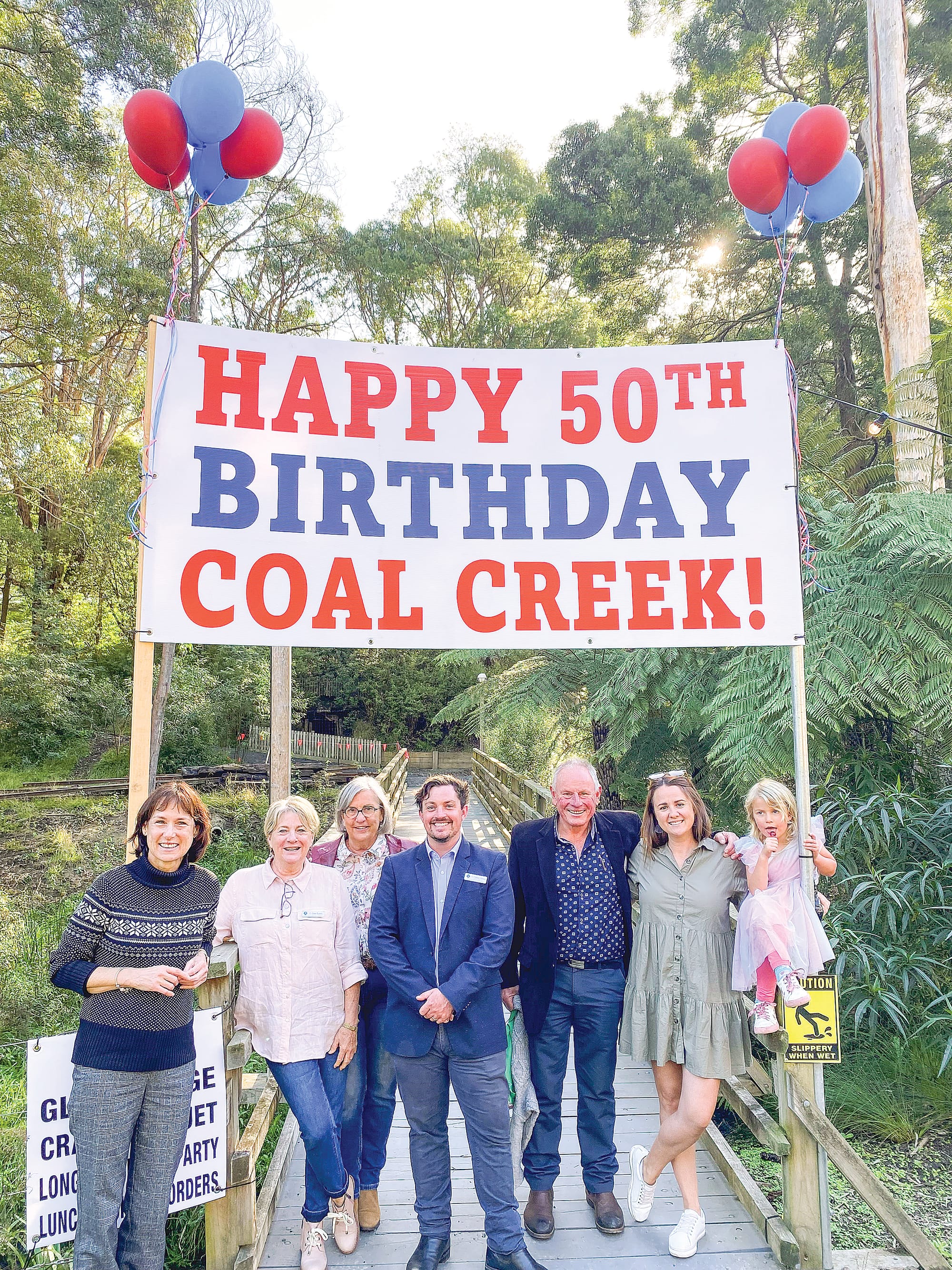 Eastern Victoria MLC Melina Bath, South Gippsland Shire Councillor’s Cr Jenni Keerie, Cr Mohya Davies, deputy mayor Cr Nathan Hersey, Cr John Schelling, mayor Cr Clare Williams, and Cr Schelling’s granddaughter Harley Browne helped Coal Creek celebrate 50 years on Saturday.