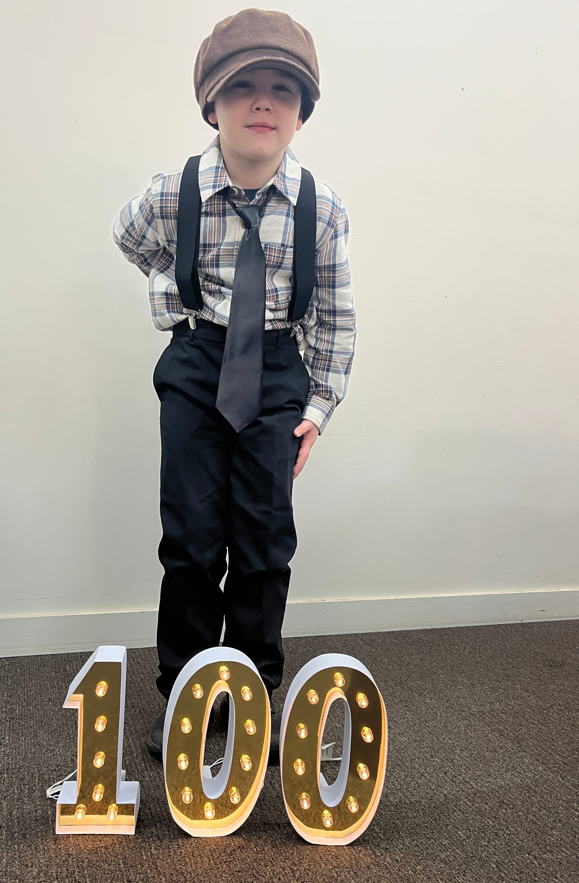 Hudson holds his poor old man's aching back.