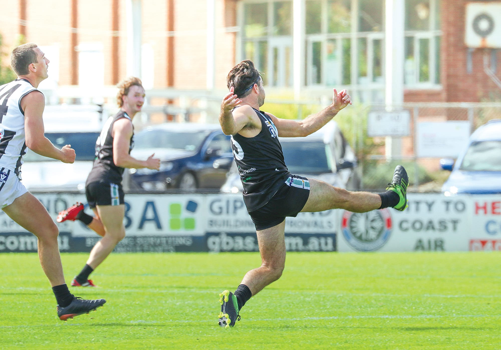 ack Blair kicks the first goal for Wonthaggi Power in the first game of the season against Sale at their home ground. Z25_1423