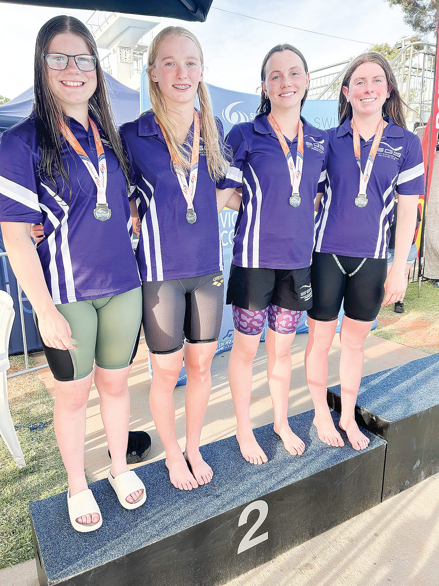 The second place, silver medal winning 16 and under girls medley relay