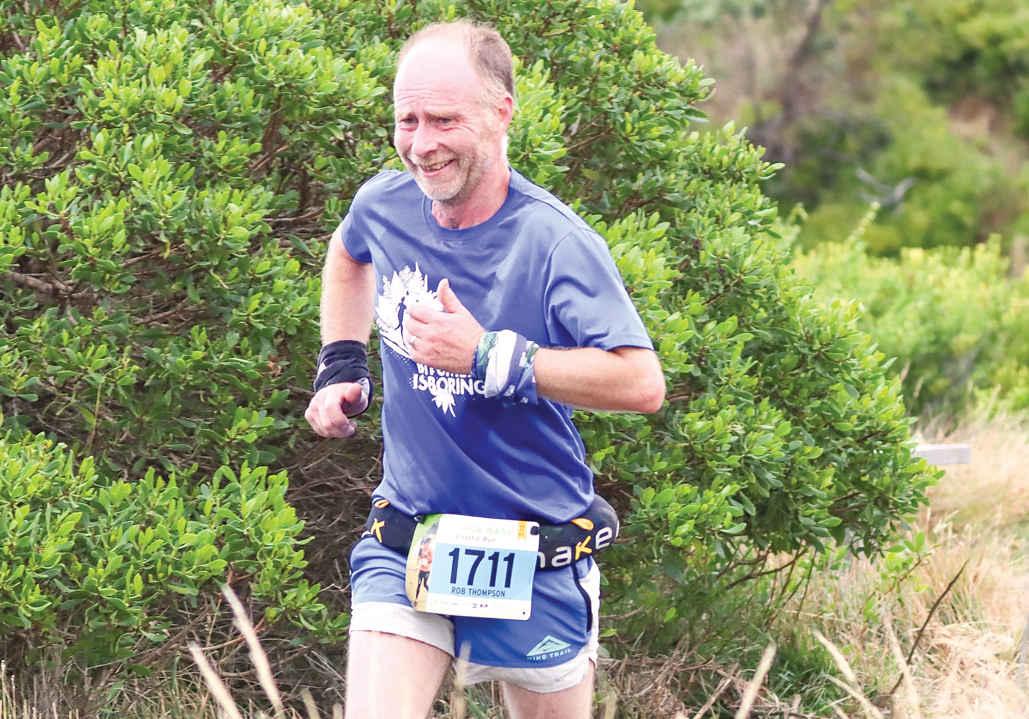 Rob Thompson shows the exertion of the 17-kilometre run but went on to win the event. A24_0623