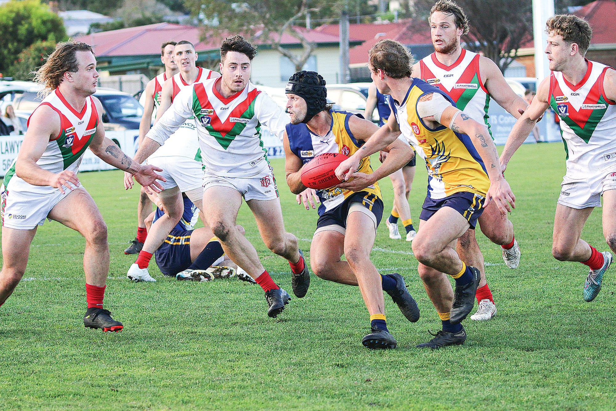Inverloch Kongwak’s Will Hams looks to escape the oncoming pack.