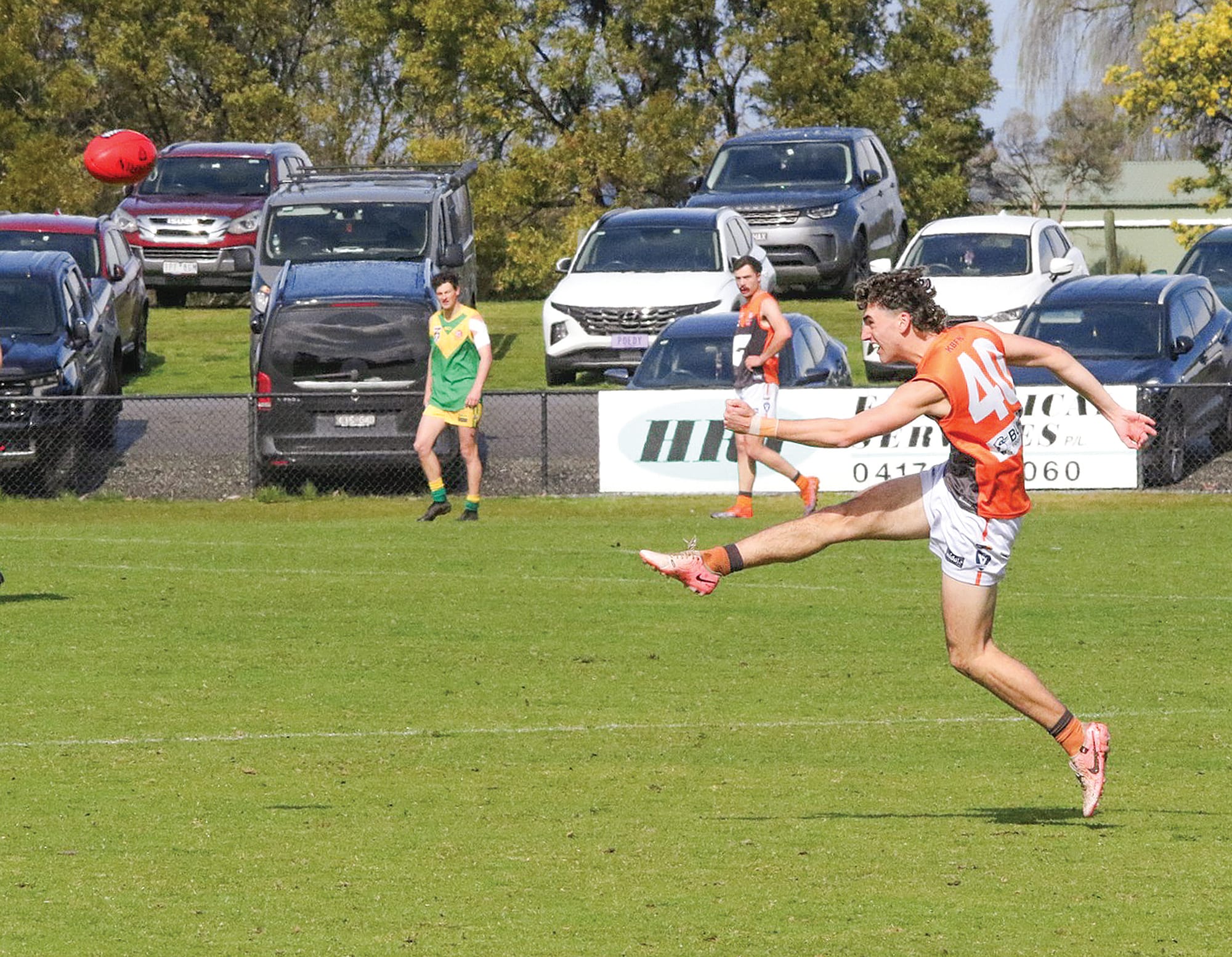 Korumburra Bena’s Zachary Barrett boots a solid pass into the midfield during the reserves match with Garfield.
