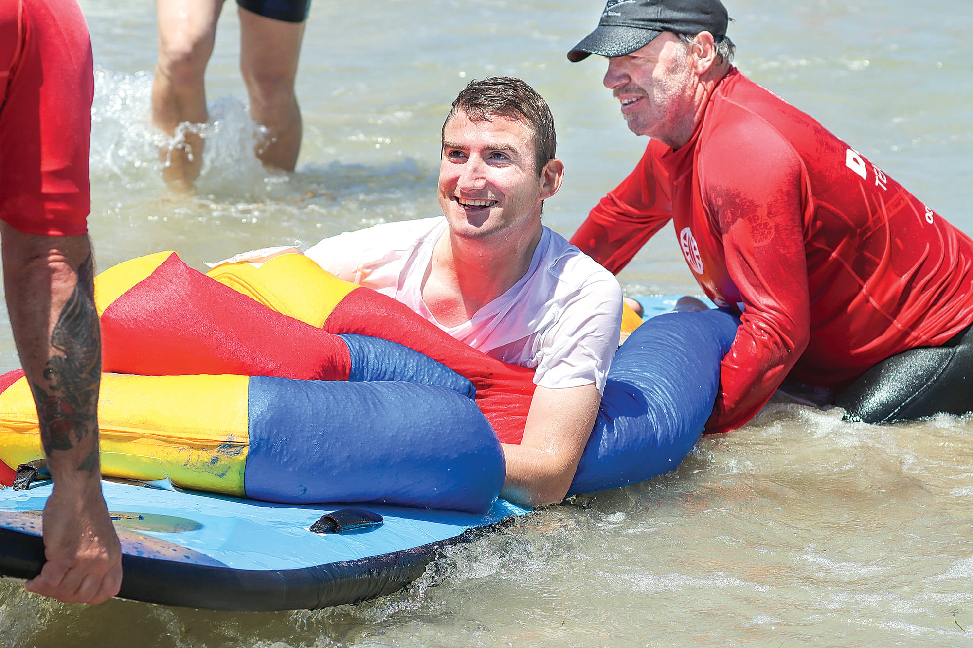 Andrew David’s face lights up during his surfing session. A28_0423