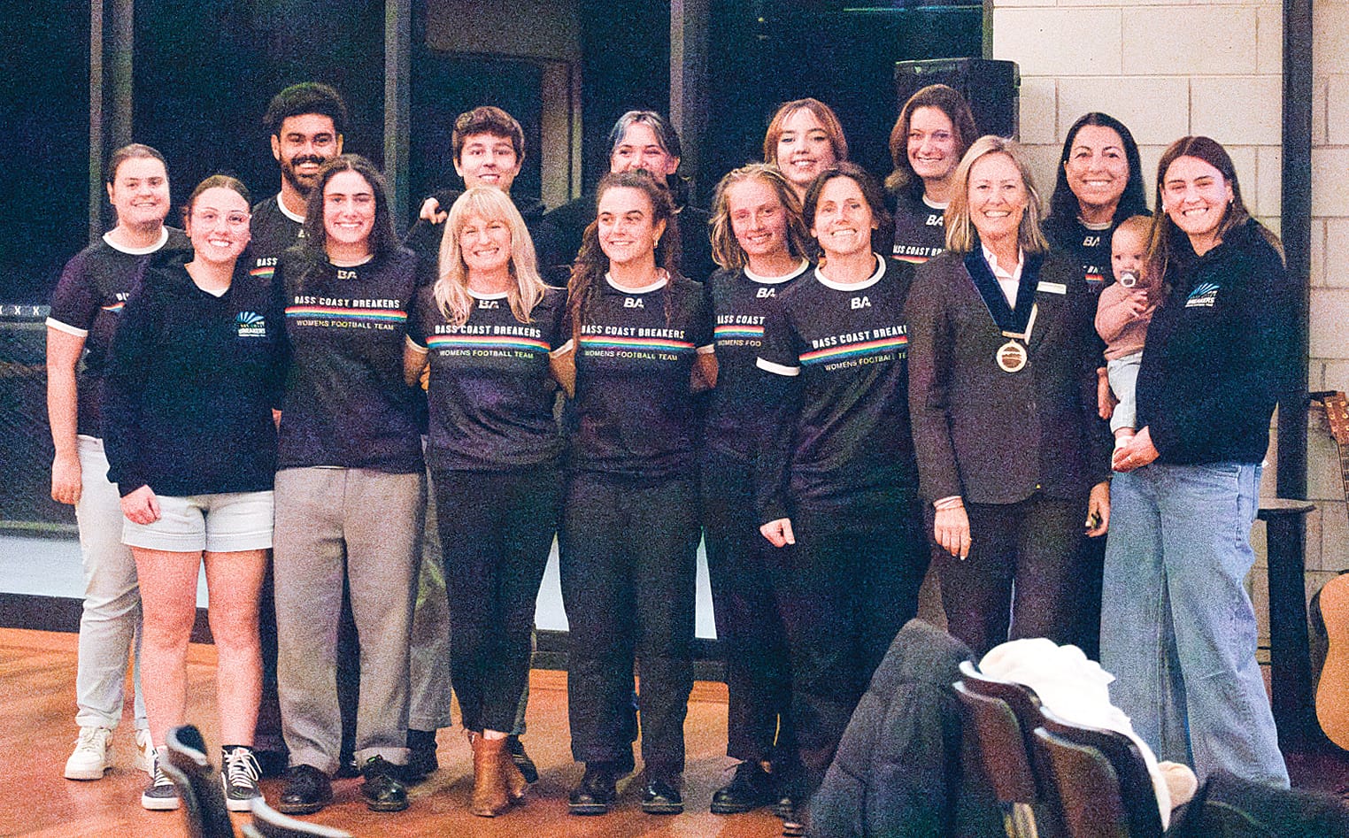 Members of the Bass Coast Breakers Women’s Football Team celebrate their win of the Contribution to Sports Leadership Award. W02_2225