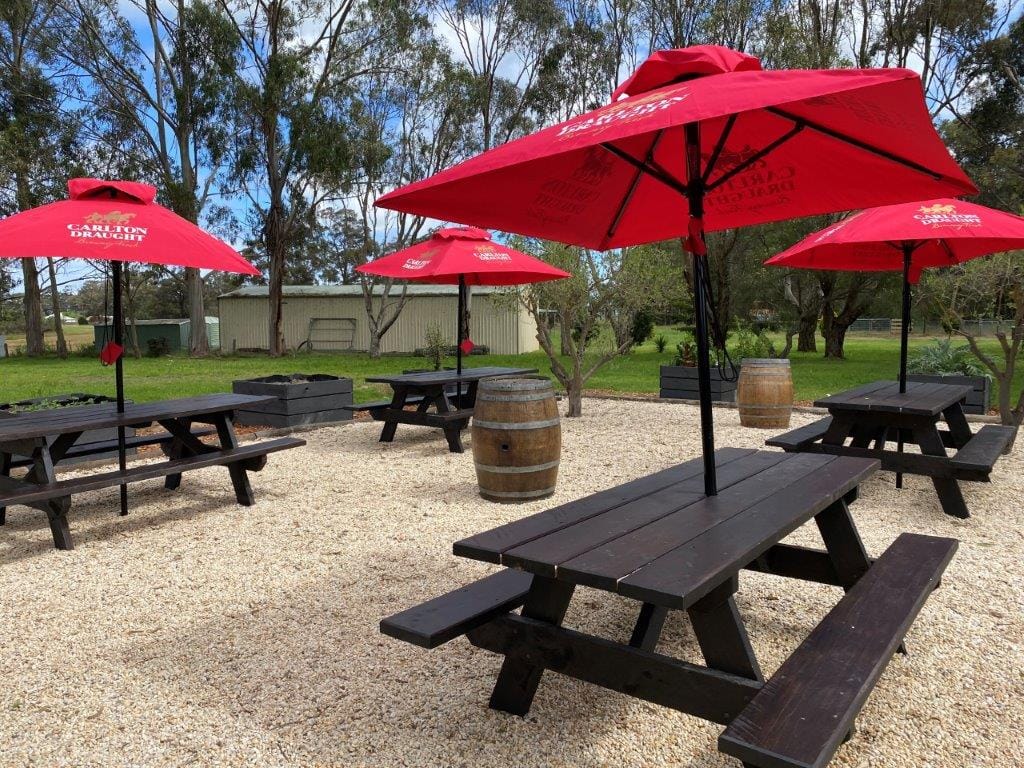 Enjoy a cool drink and a great meal with friends in the Woodside Beach Hotel beer garden.