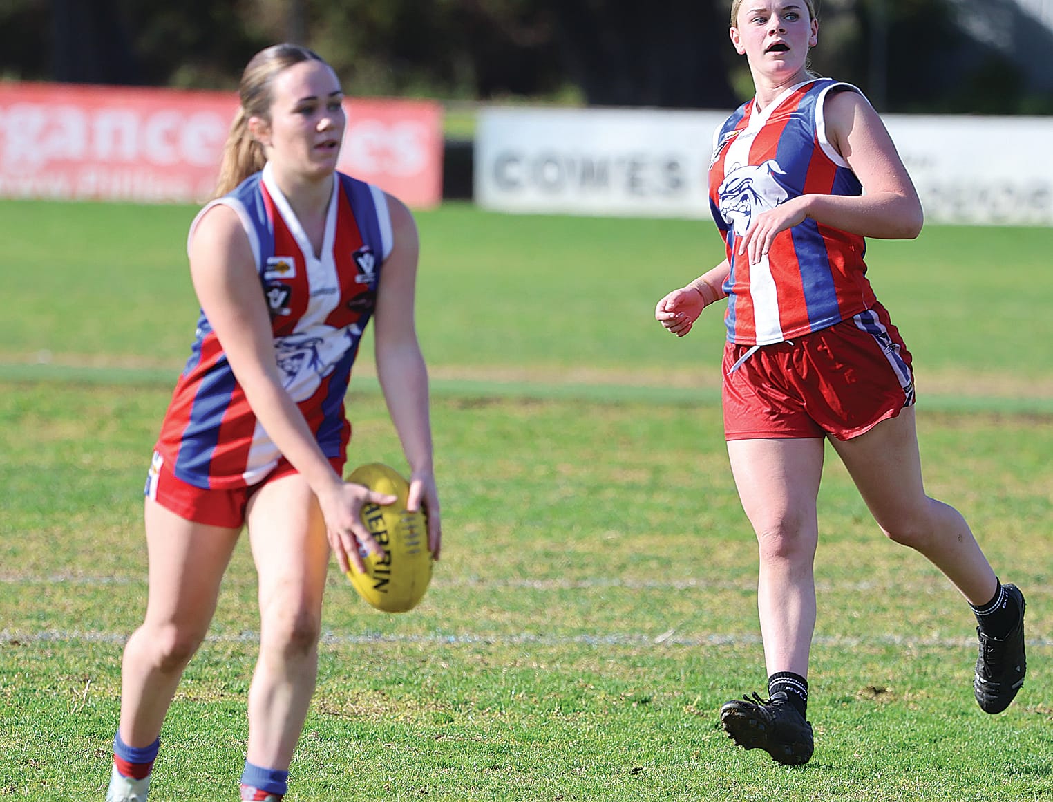A Phillip Island under 16 player gets into the clear during an impressive showing by the locals at Cowes on Sunday.
