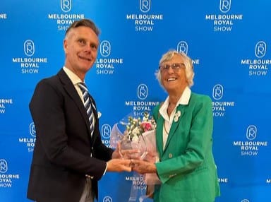Inverloch’s Anne Gibson receives an award from Melbourne Royal Show CEO Brad Jenkins after her Garryowen mount of September 1953, Don Quixote, was elevated to the time-honoured event’s hall of fame.