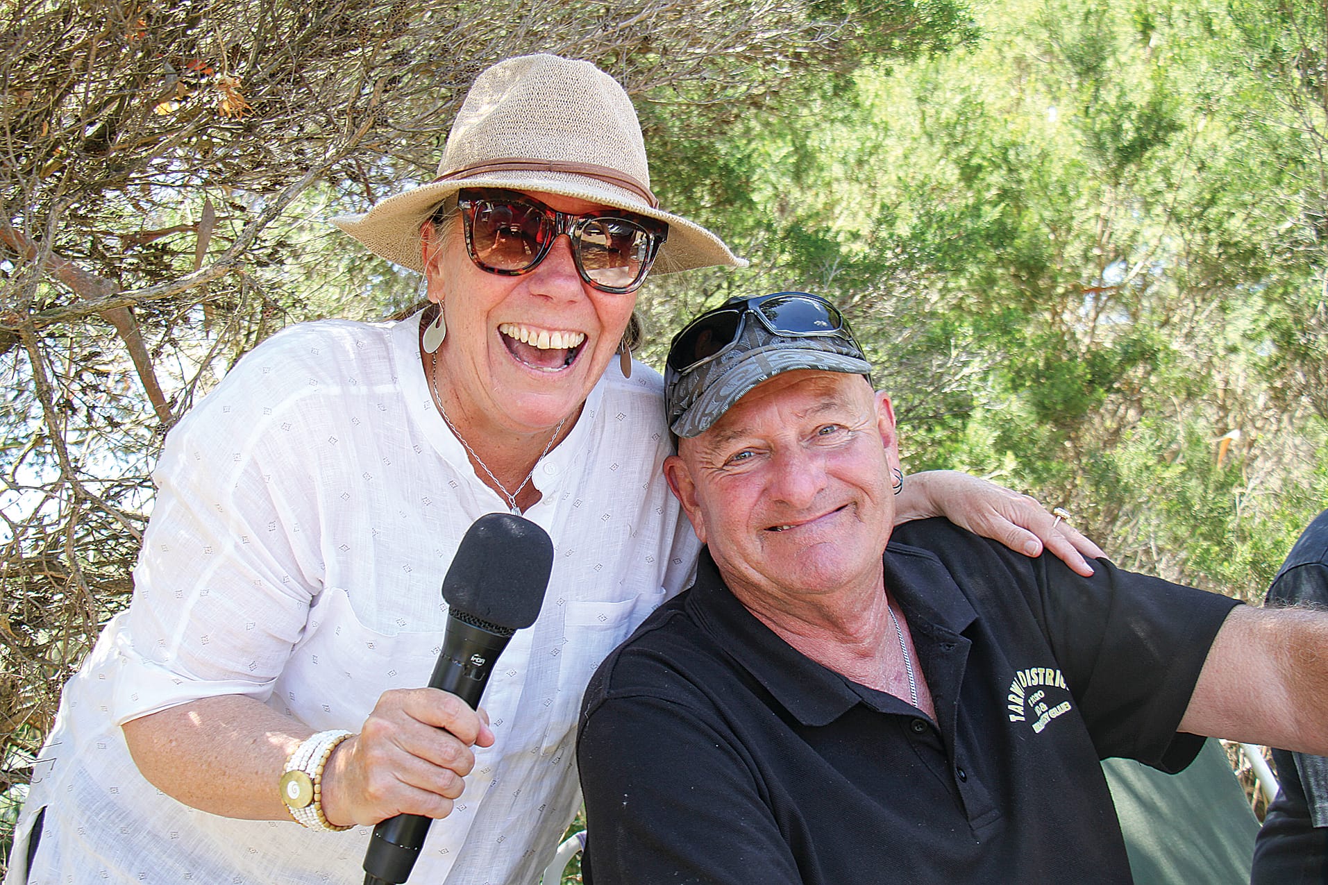 South Gippsland Shire Deputy Mayor Cr Sarah Gilligan with Tarwin District Auto and Machinery Club President Graham Kennedy preparing for the duck derby. B32_0425