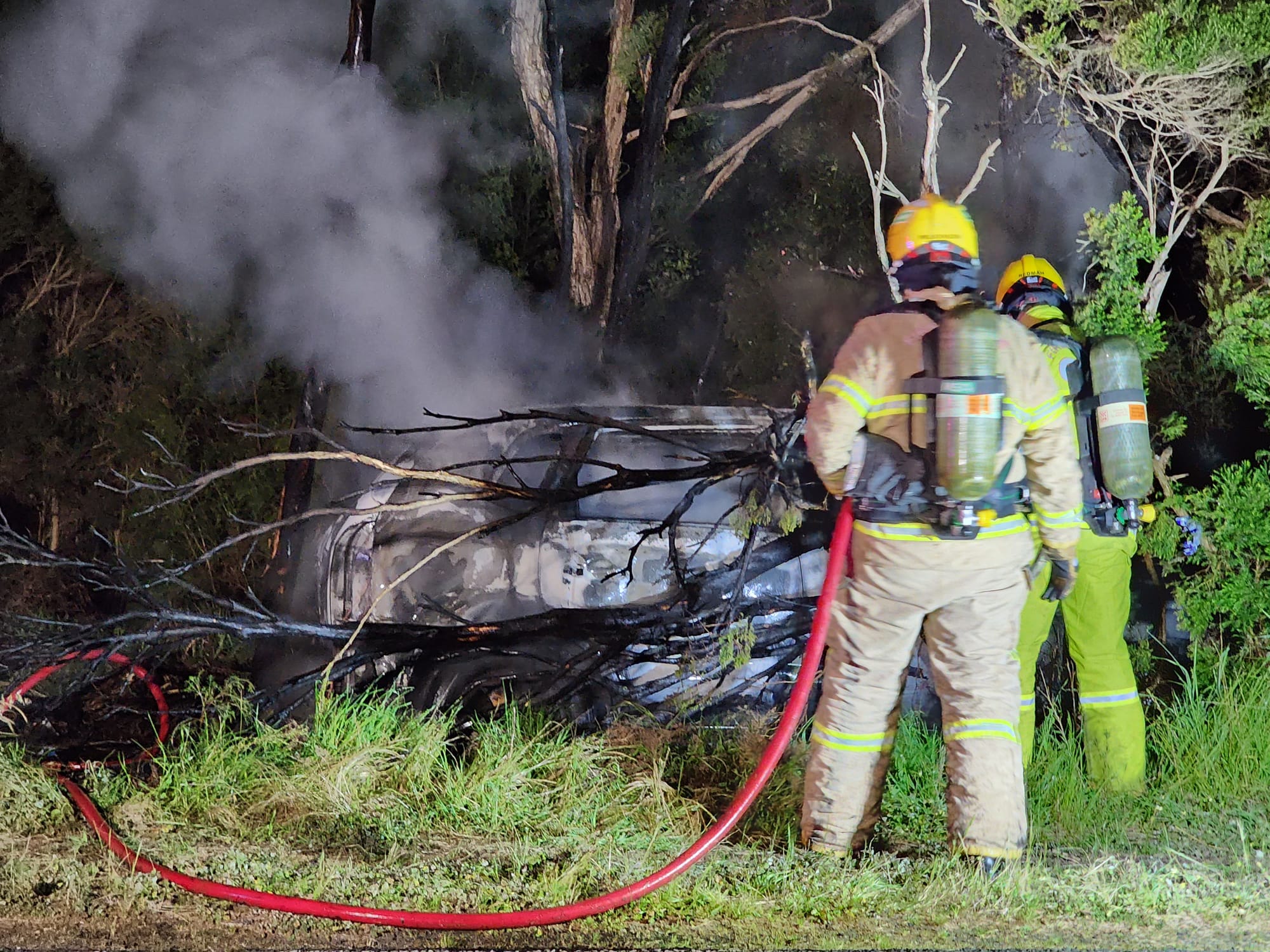 Abandoned car engulfed in flames