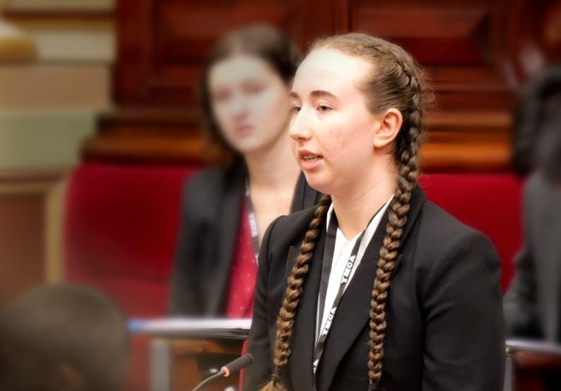 Year 11 student Miranda Zalunardo speaks to the Bill presented by Newhaven College at Victorian Youth Parliament.