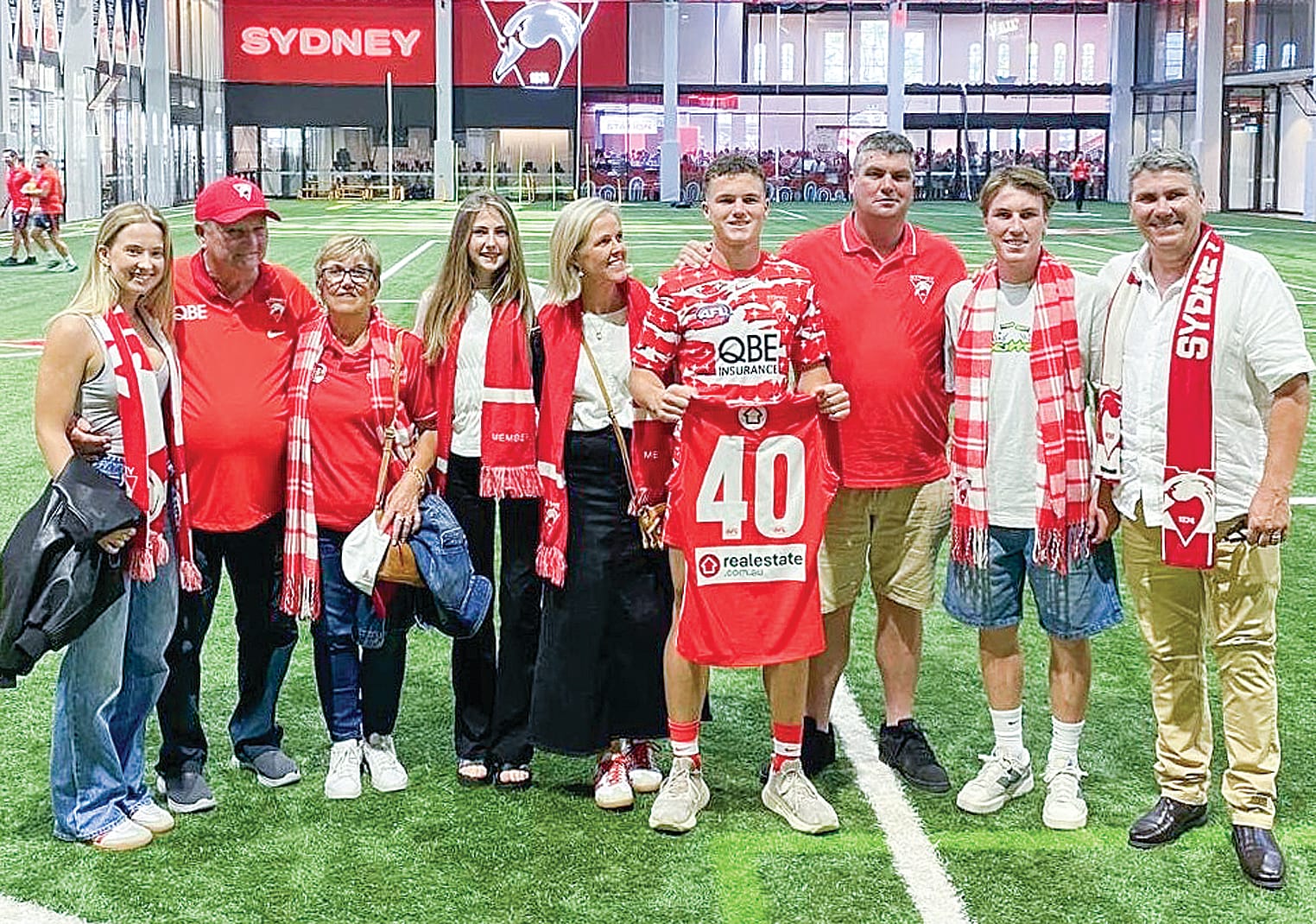 Friends and family fly in to welcome a new Swan