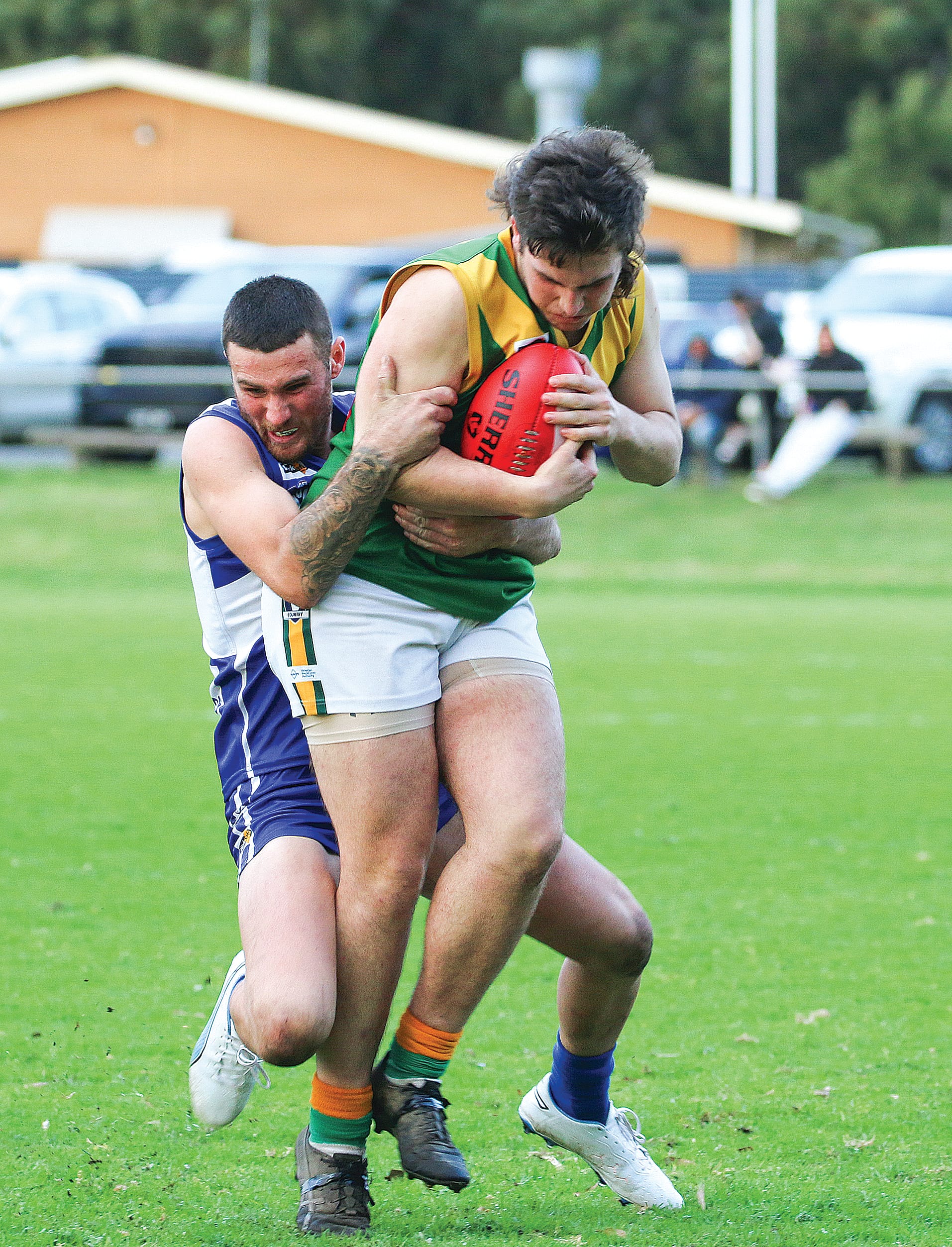 Hill End tries to break from Tarwin’s Corey Green.