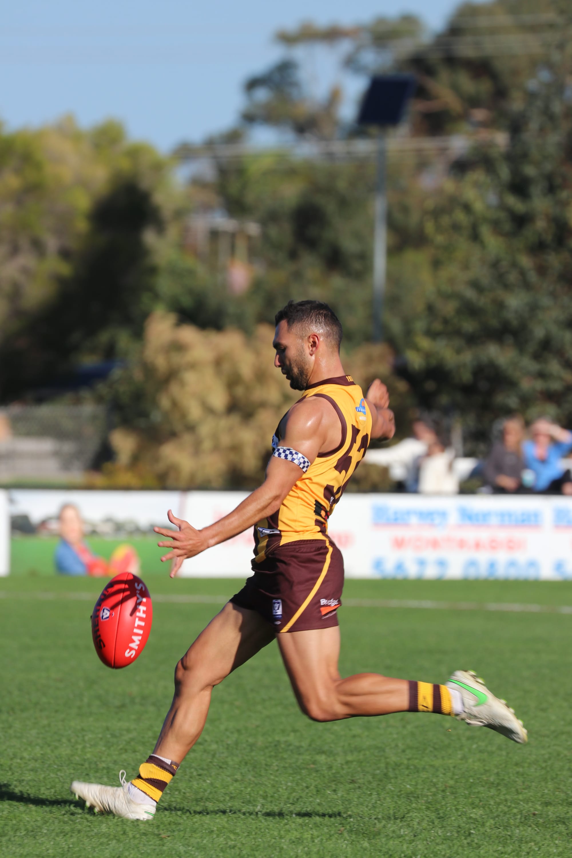 Box Hill Hawks Ben Cavarra kicks the fifth and six goal against the Saints in the first quarter. 