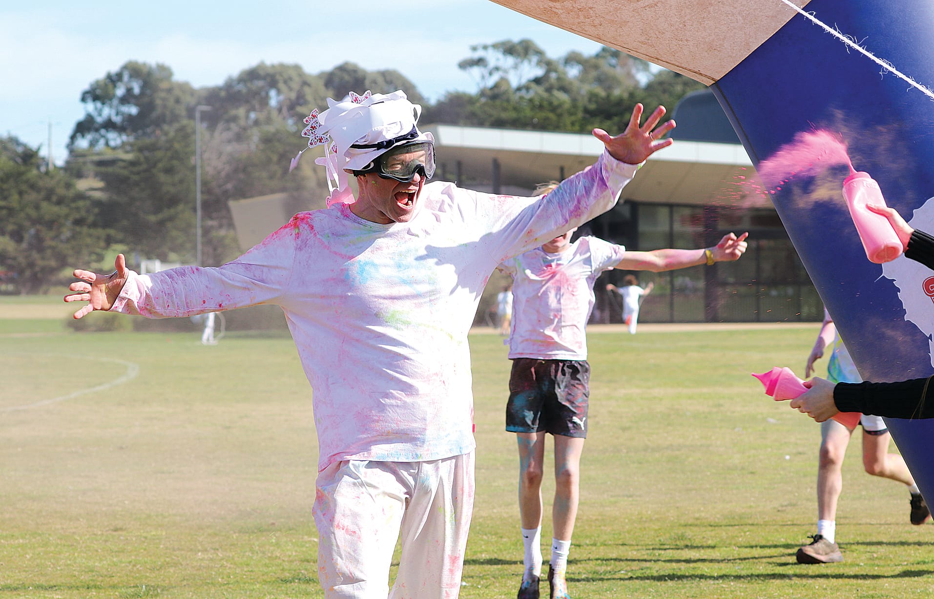 Middle School teacher Simon Furniss participates in the Newhaven College Colour Run. Z17_3223