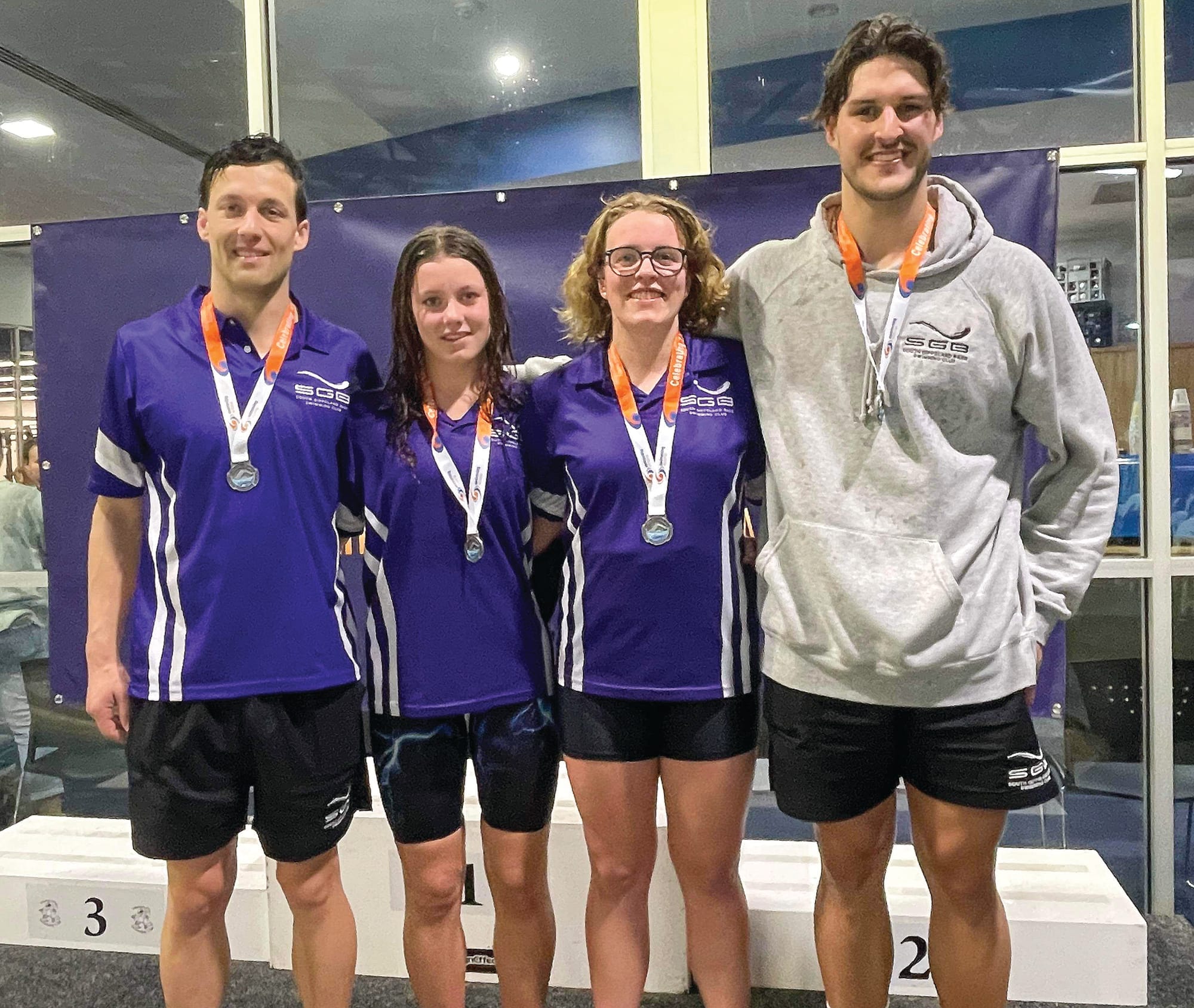 South Gippsland Bass’ Dylan Muir Olivia Holmes Tomei Dal Pozzo and Caiden Gill celebrate second in the relay.
