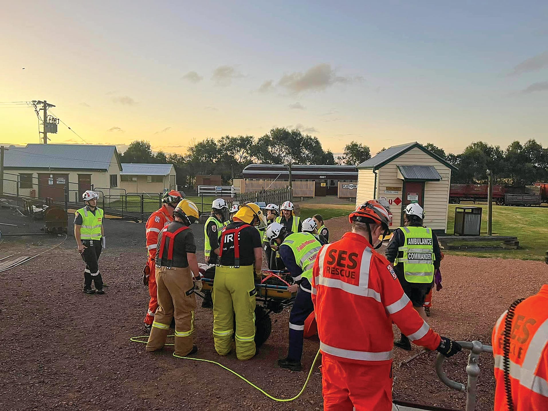 Attending to the patient after retrieval from underground.