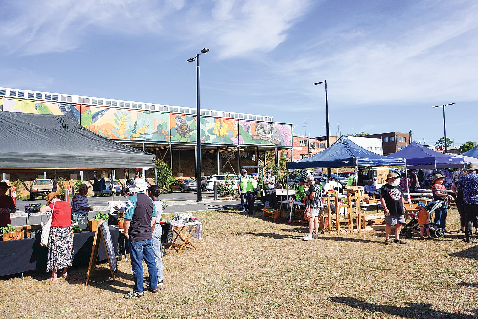 The railway precinct mural gives a colourful touch to the market.