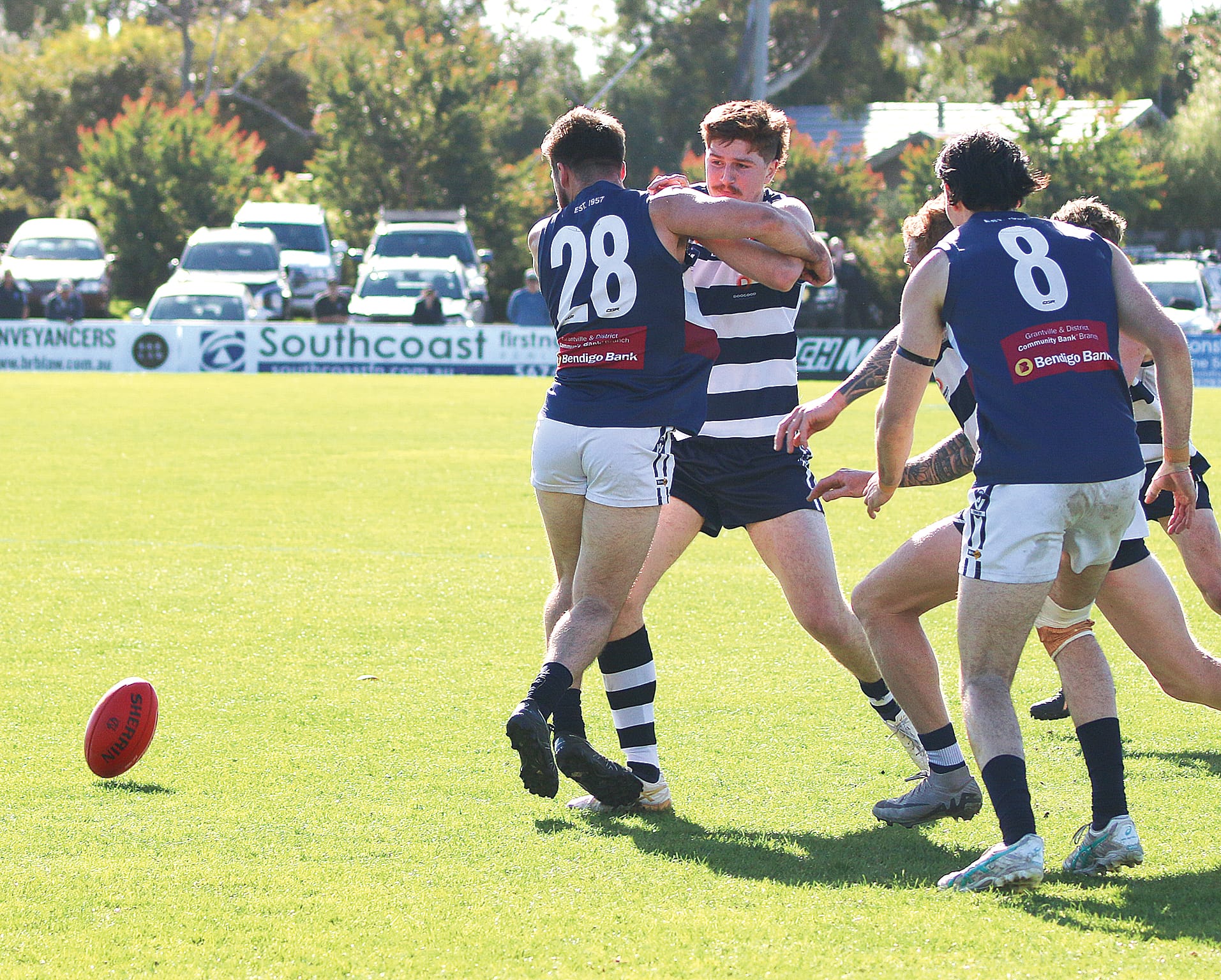 Bradley Aldwell and Dean McRae take their focus off the ball. ob29_3524