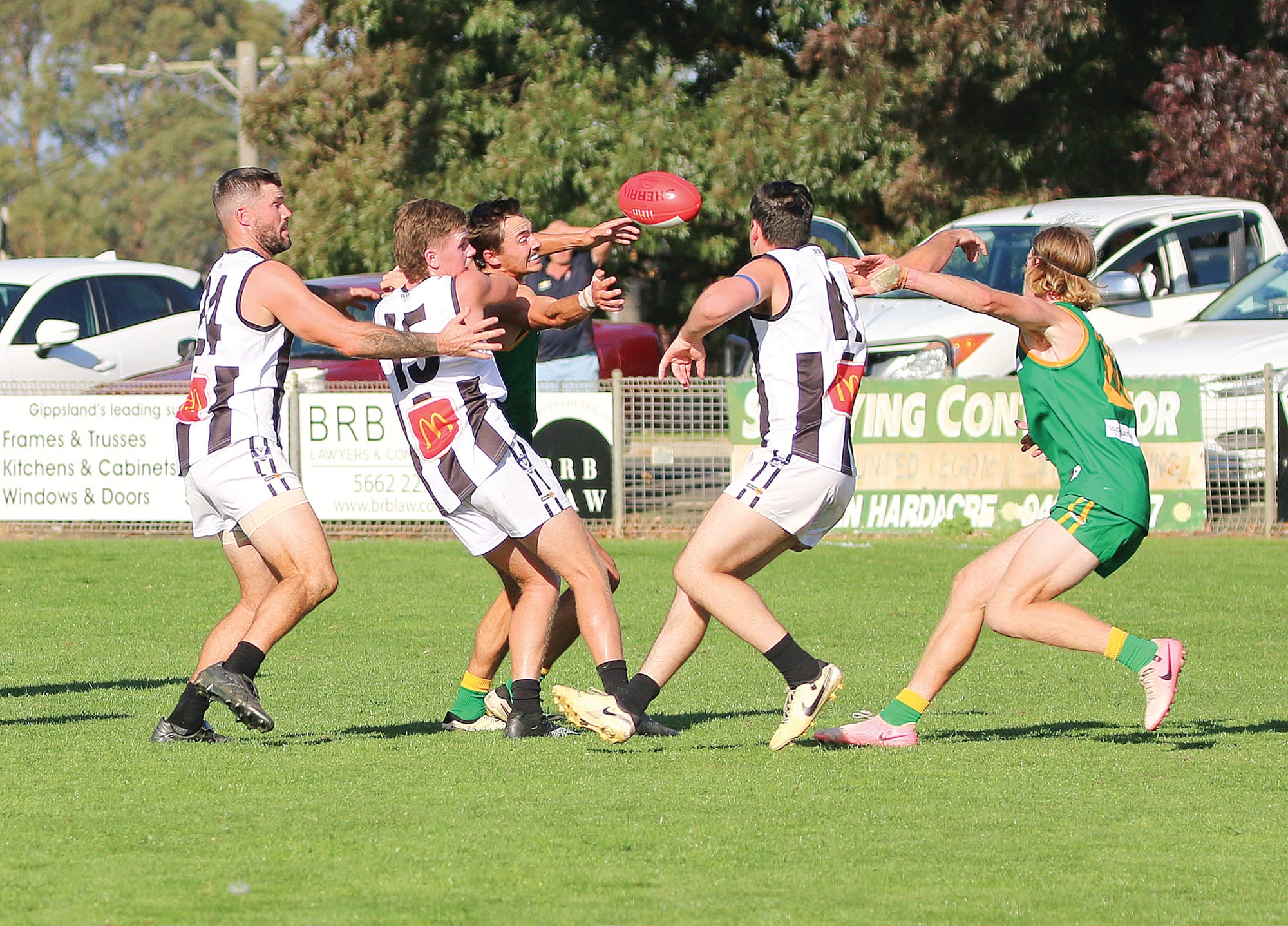 Leongatha and Sale tussle for the ball. ob31_1525
