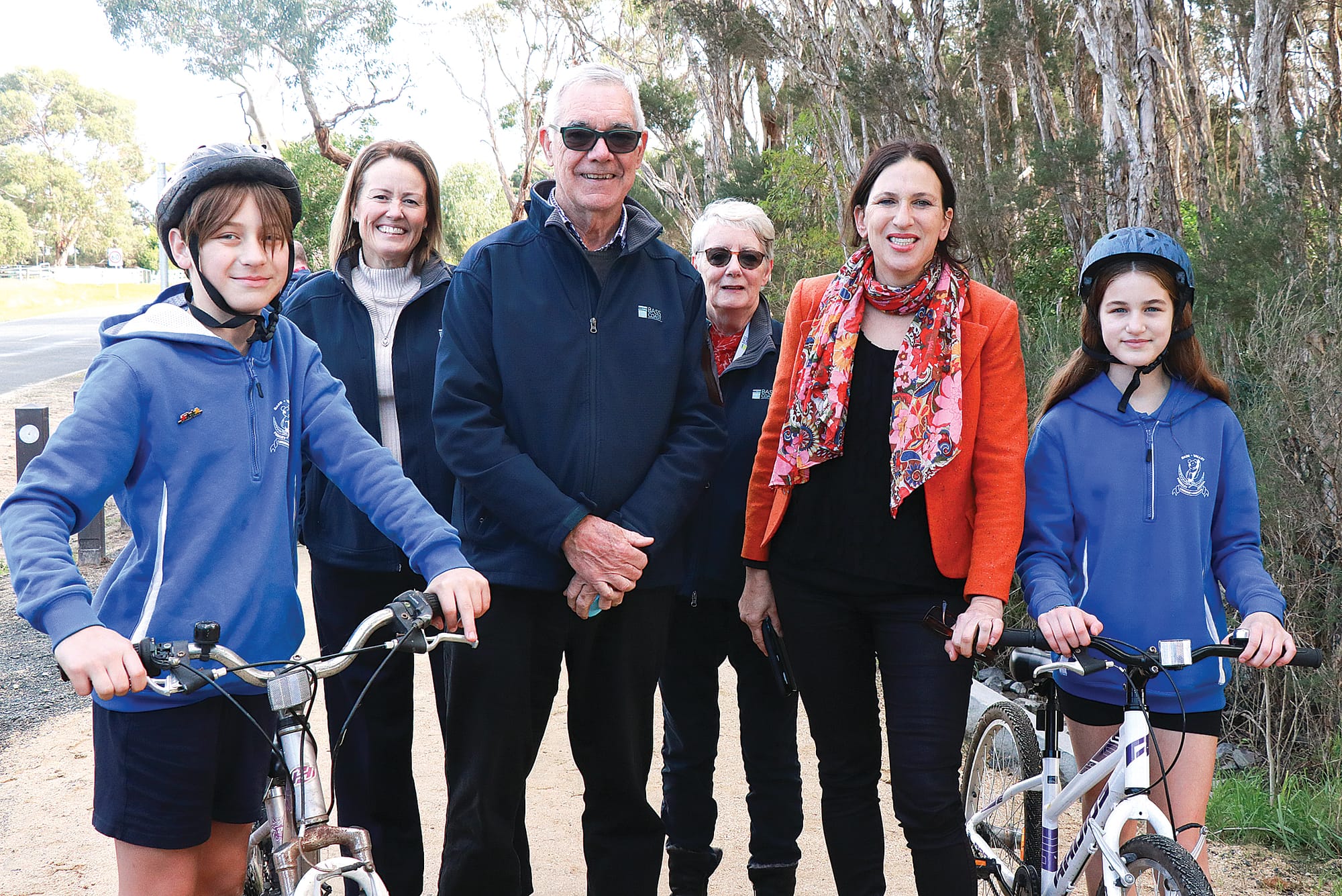 Bass Valley Primary School hosted the official opening of the Guy Road shared pathway. Pictured L to R student voice leader Miller, Deputy Mayor Cr Rochelle Halstead, Mayor Cr Michael Whelan, Cr Clare Le Serve, with Bass MP Jordan Crugnale and STEAM leader Lizzie. Z04_2323 