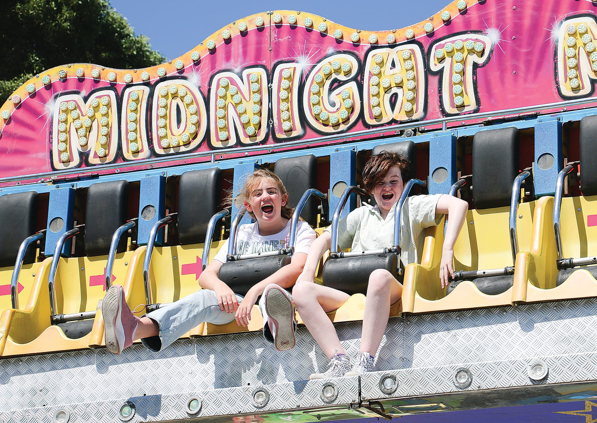 Wonthaggi thrill seekers Sophia Birkett and Anna Barnes on the Midnight Madness ride at the Korumburra Show.