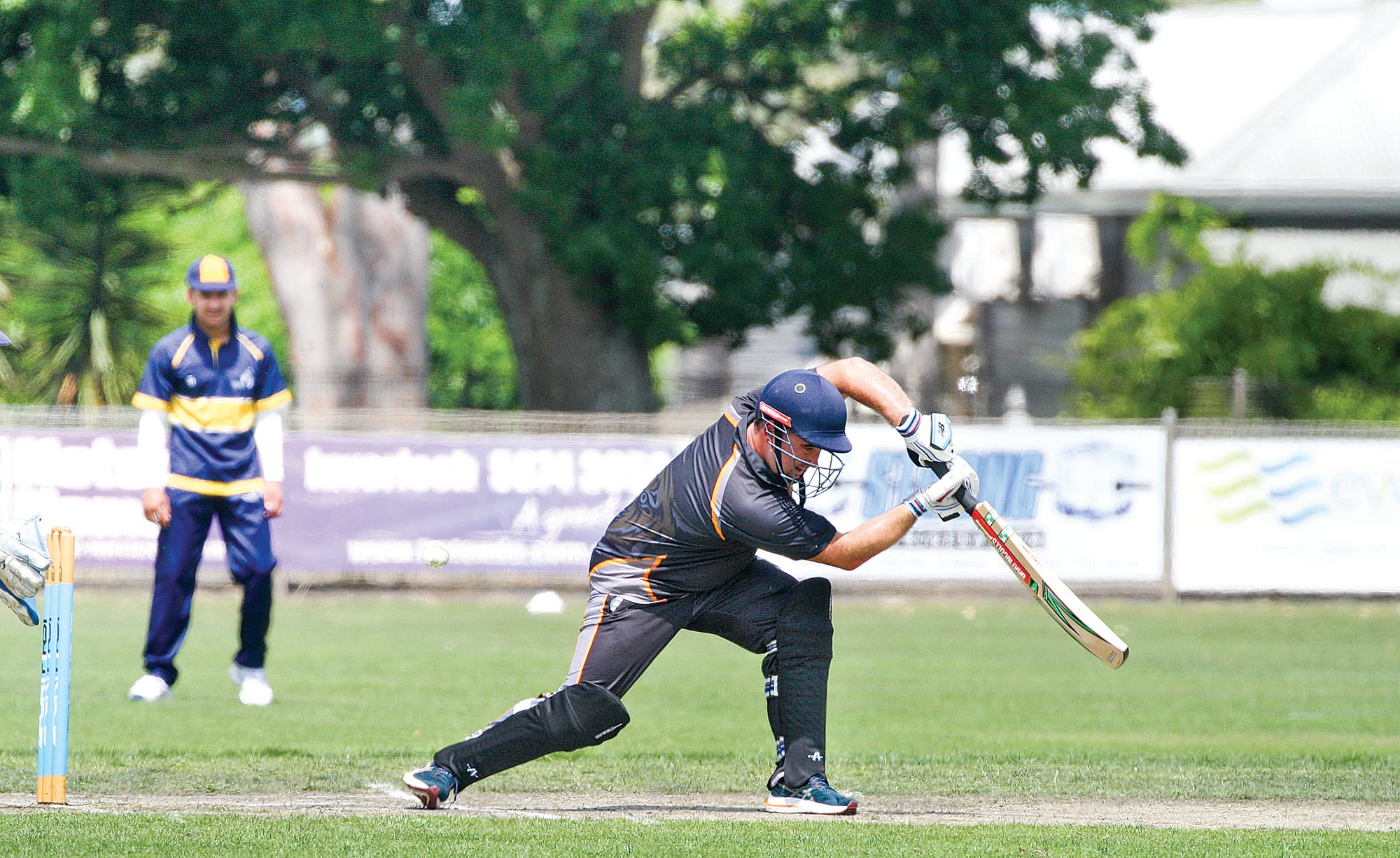 It’s a balancing act as Smith hits out a solid shot. 