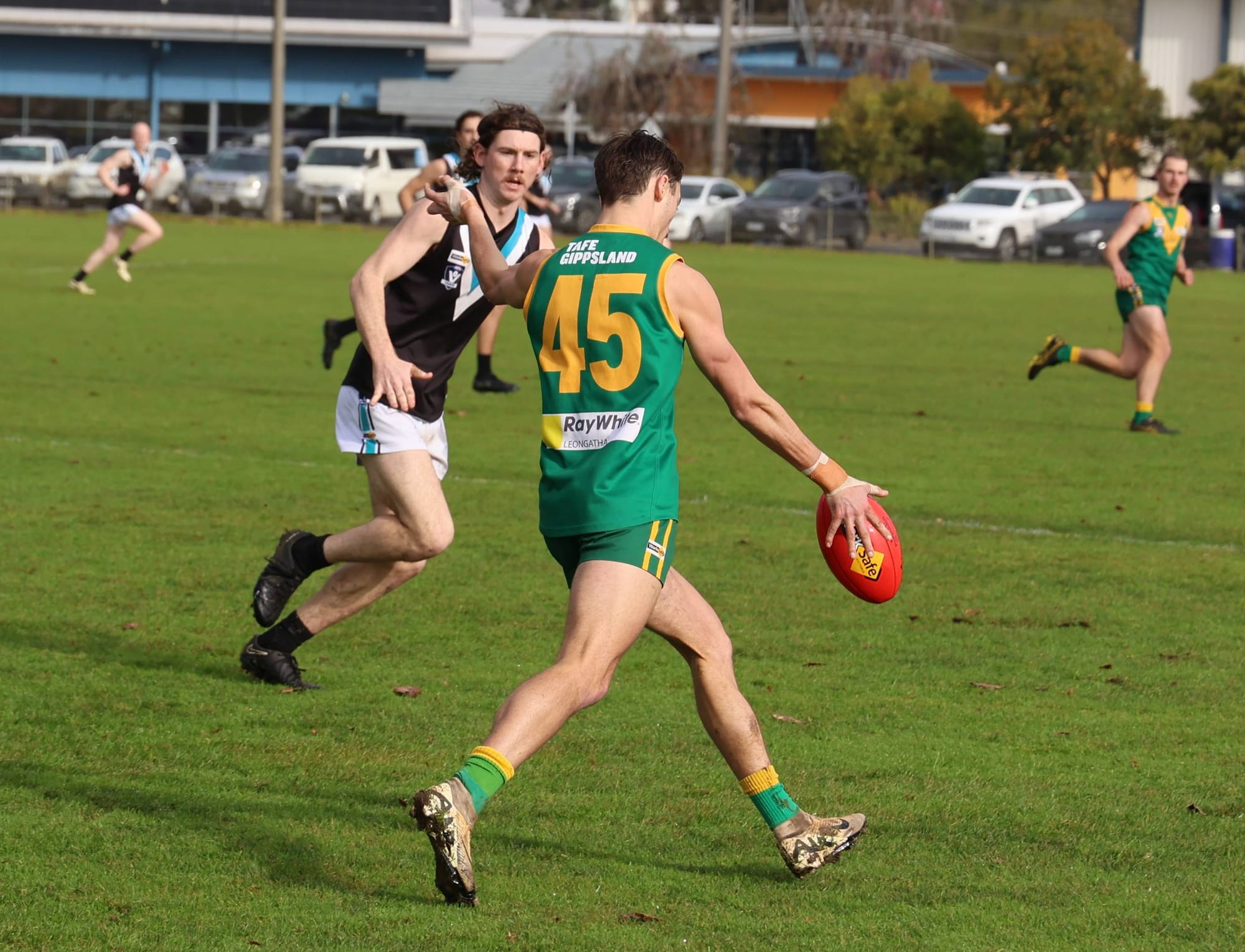 Travis Nash clears the Wonthaggi Power attacking end in a game where both defences were winners on the day in a low-scoring affair at Parrot Park.