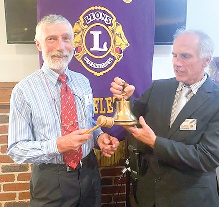 President-Elect Frank Hirst, receives the symbols of office from outgoing President James O’Connor.