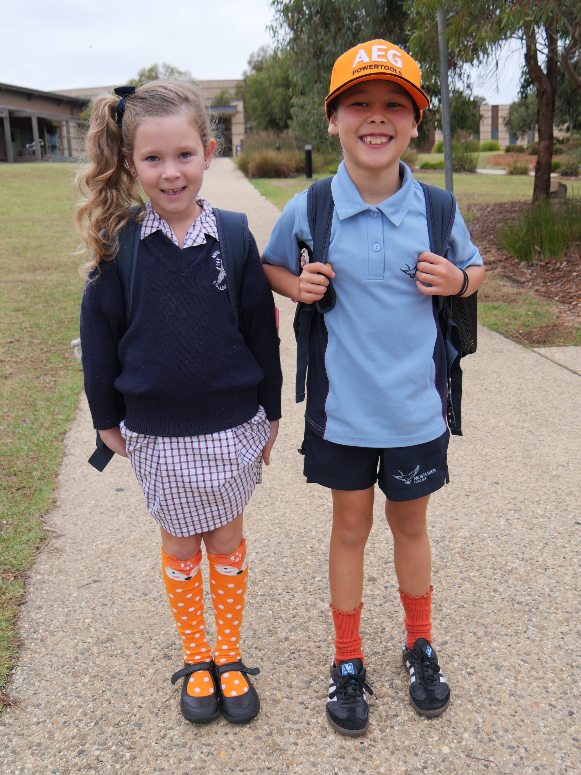 Newhaven College Junior School students Annalise Golic-Williams and Yuri Chaseling wore a ‘splash of orange’ for International Harmony Day on Friday.
