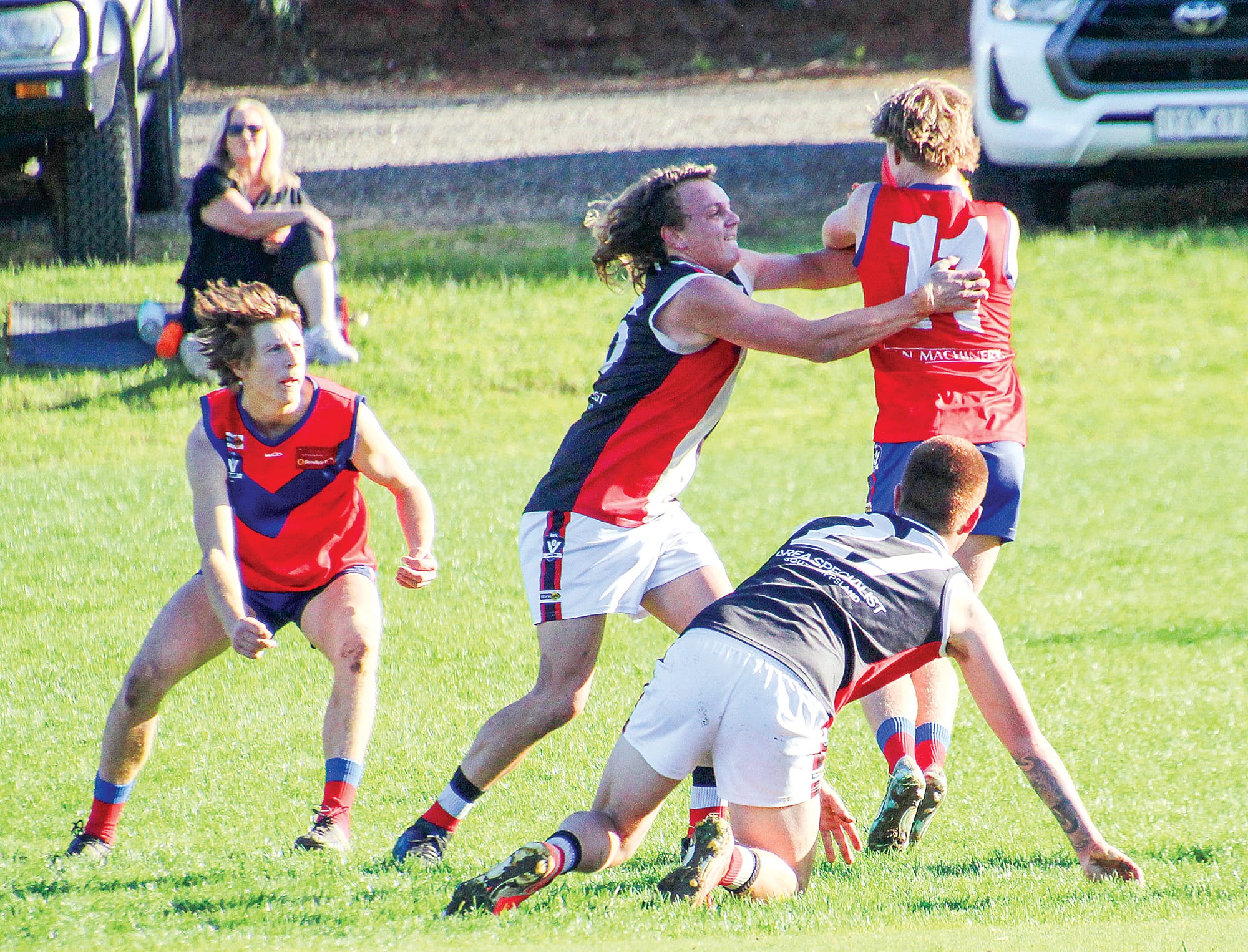 Lucas Lee applying some pressure on the Buln Buln midfield.