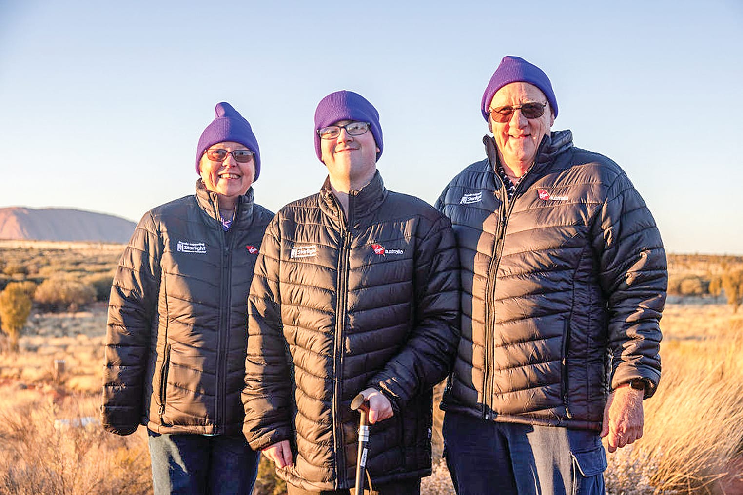 Wyatt (centre) with his nan, Susan and pa, Peter at Uluru.